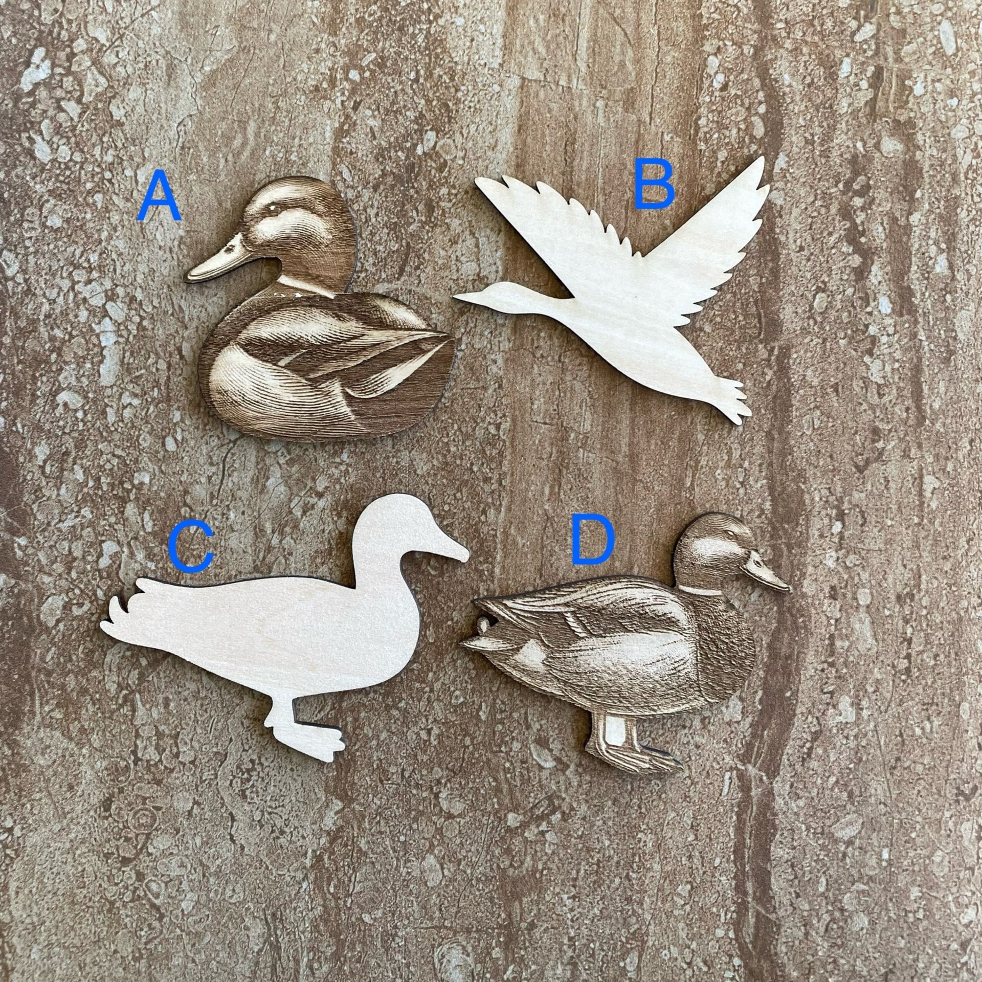 Handmade wooden DIY duck cutout in four unique styles, ready to paint or decorate