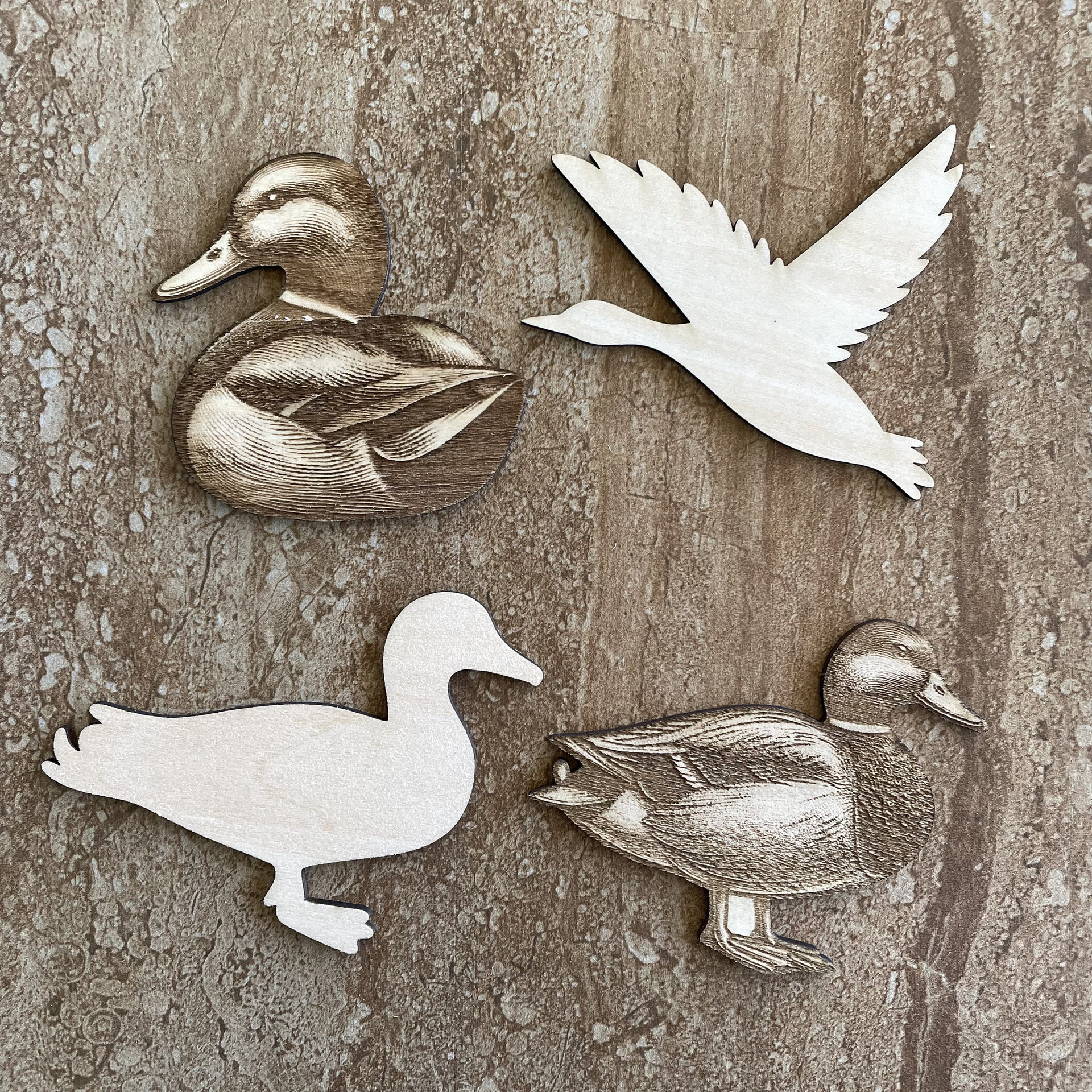 Handmade wooden DIY duck cutout in four unique styles, ready to paint or decorate