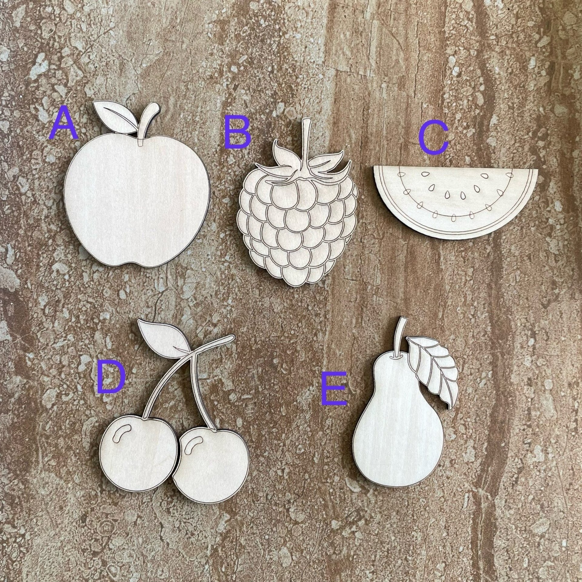 Handmade wooden DIY fruit cutout in five unique styles, ready for paint or decorating