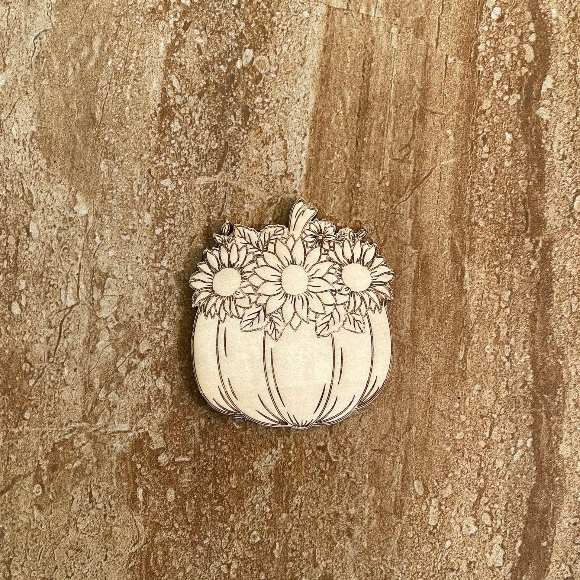 Handmade wooden DIY pumpkin cutout ready for paint or decorating