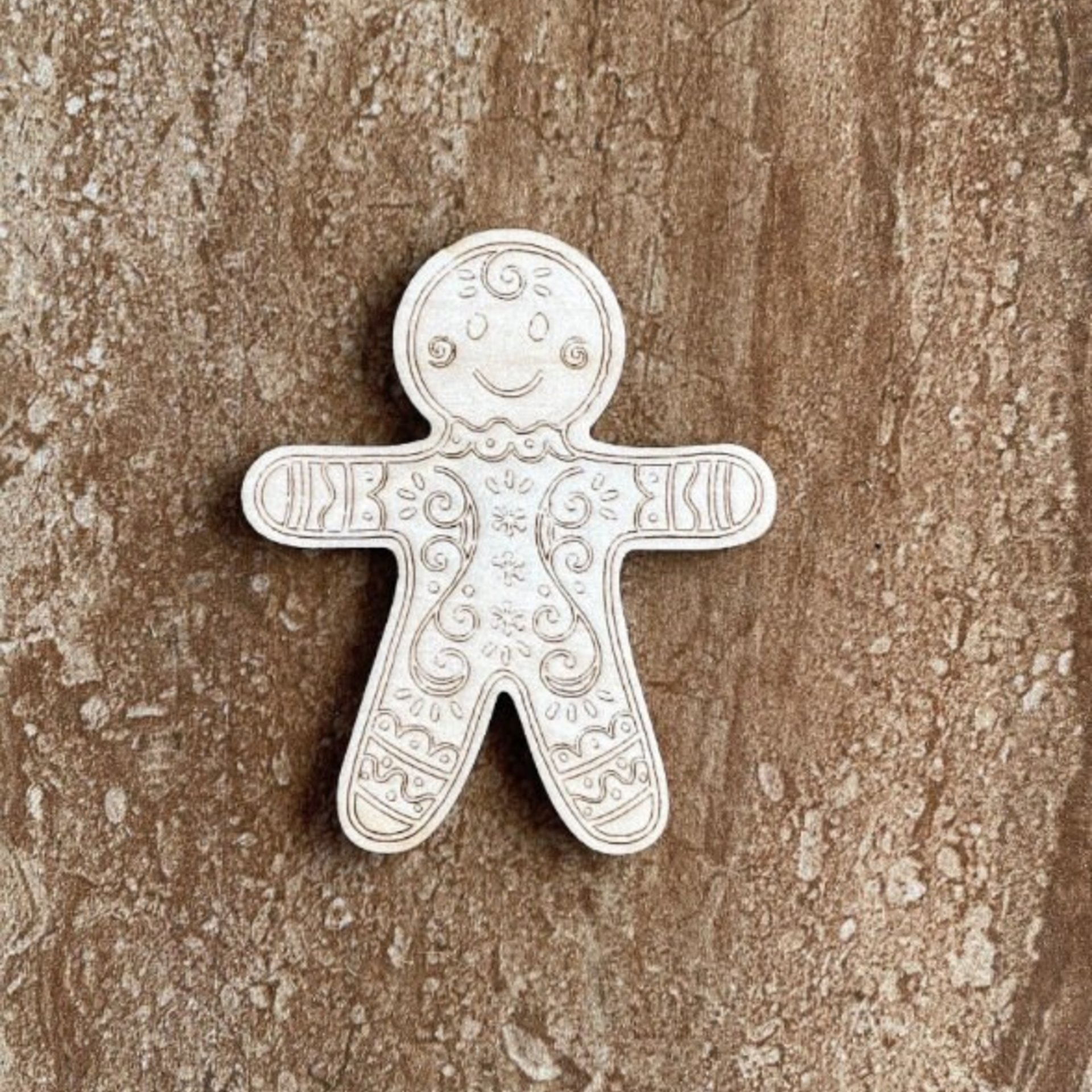Handmade wooden DIY Gingerbread man cutout ready for paint or decorating