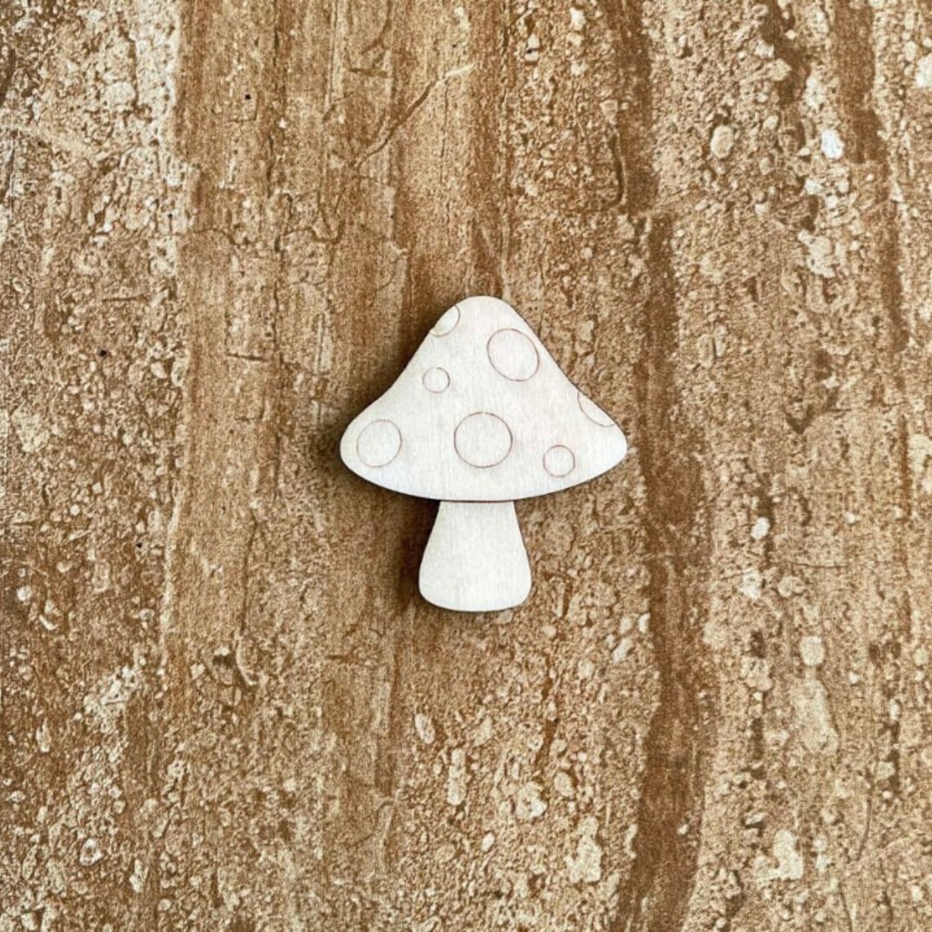 Handmade wooden DIY mushroom cutout ready for paint or decorating