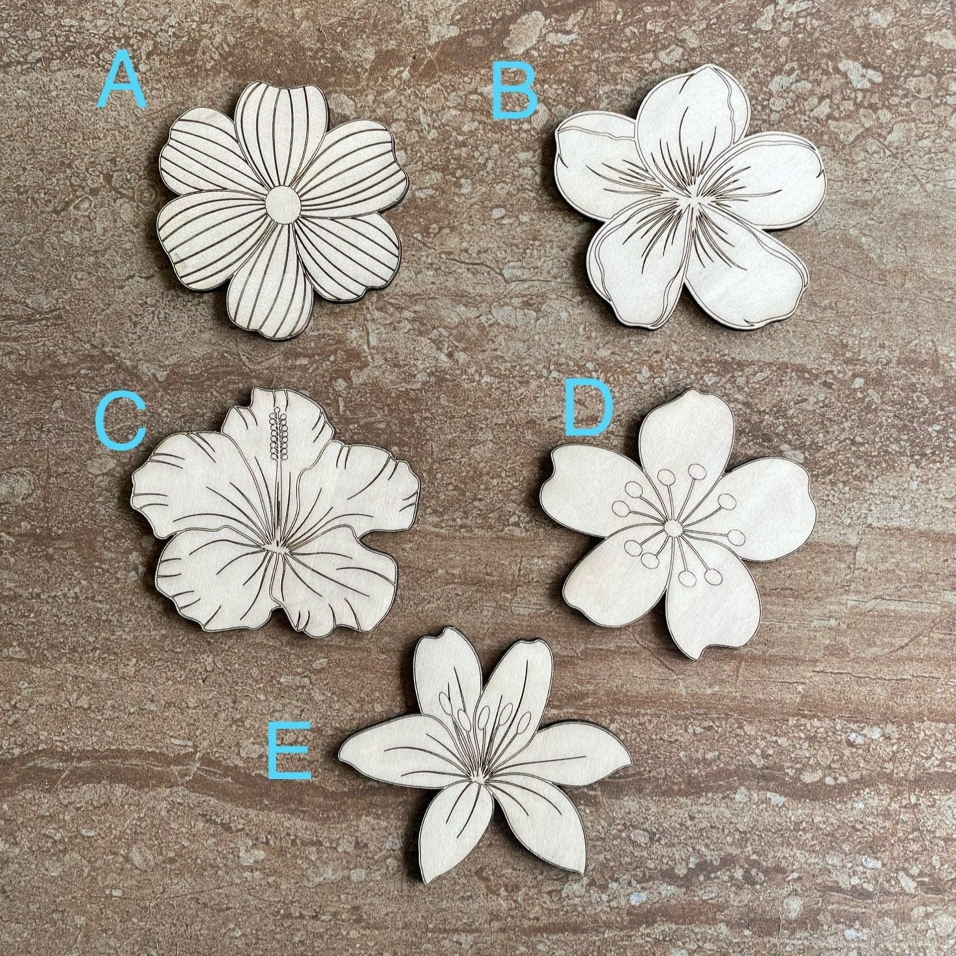 Handmade wooden DIY tropical flower cutouts in five unique styles, ready for paint or decorating