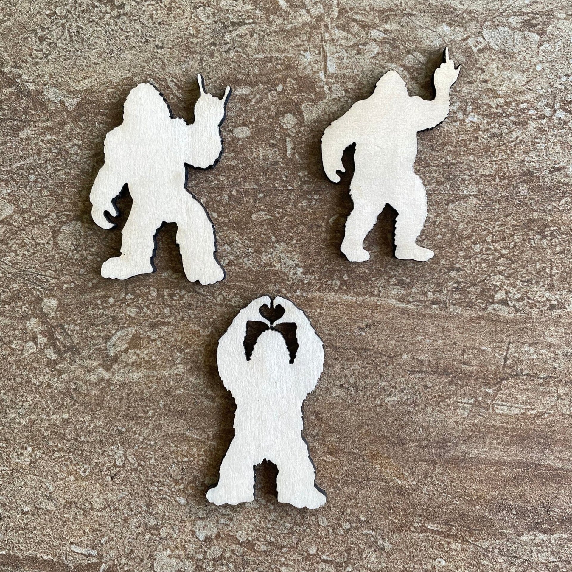 Handmade wooden DIY bigfoot cutout in three unique styles, ready to paint or decorate