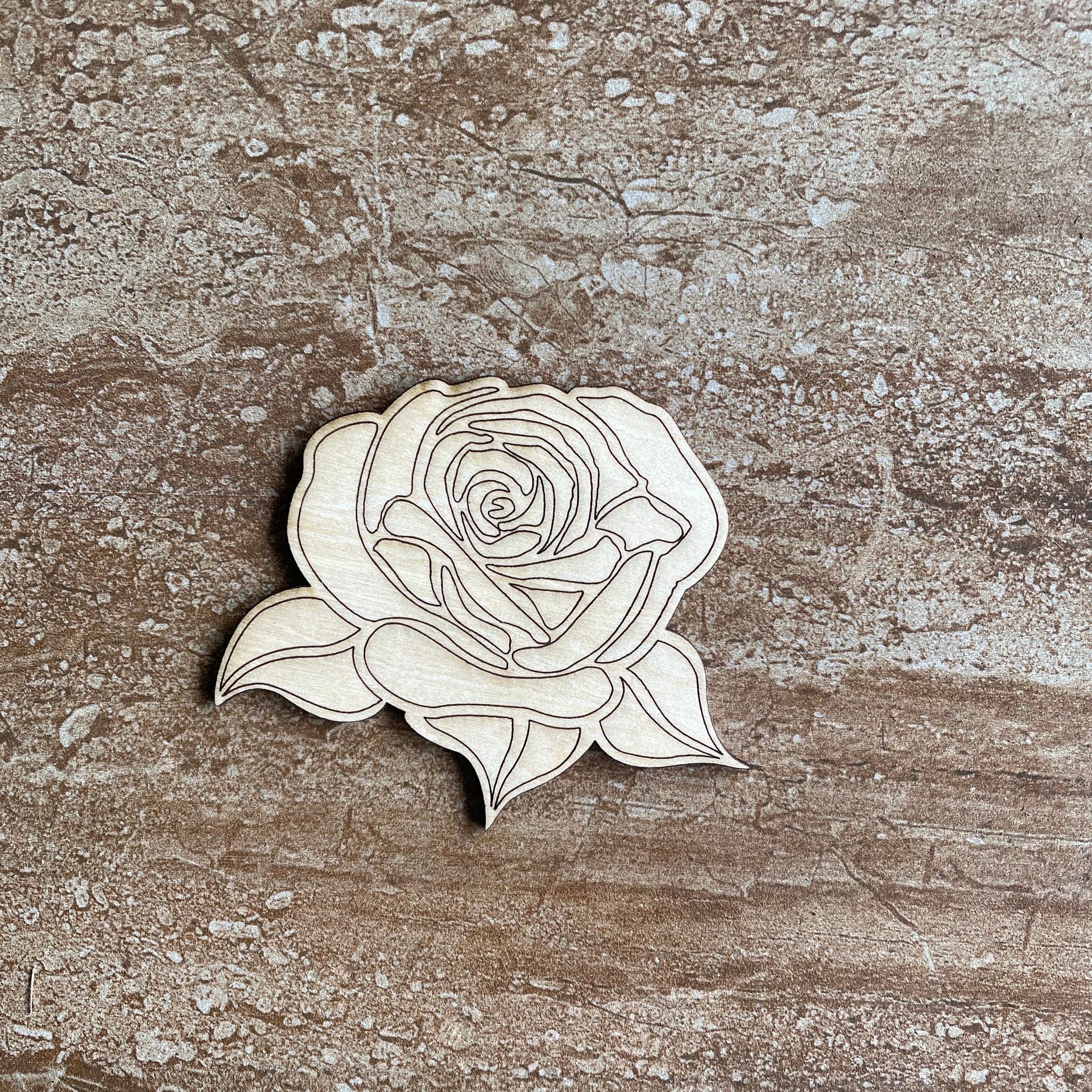 Handmade wooden DIY rose cutout ready for paint or decorations