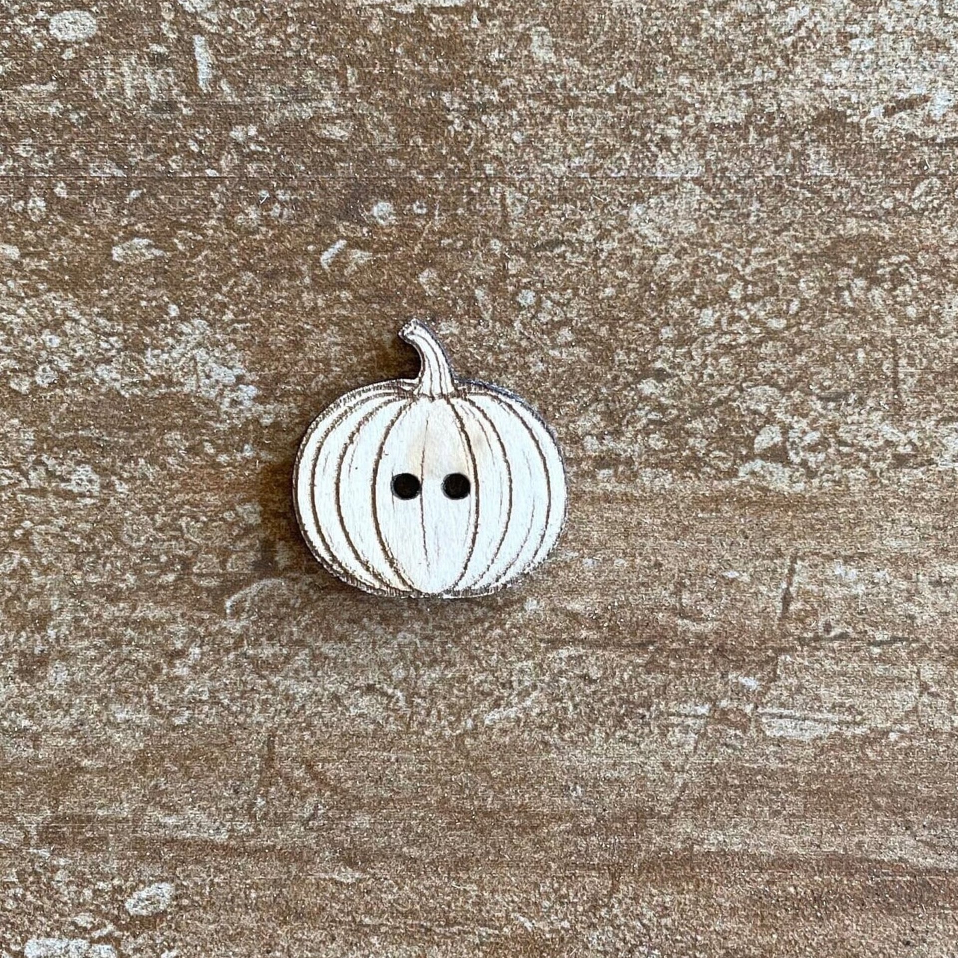 Handmade wooden pumpkin-shaped buttons for crafts, sewing, and scrapbooking
