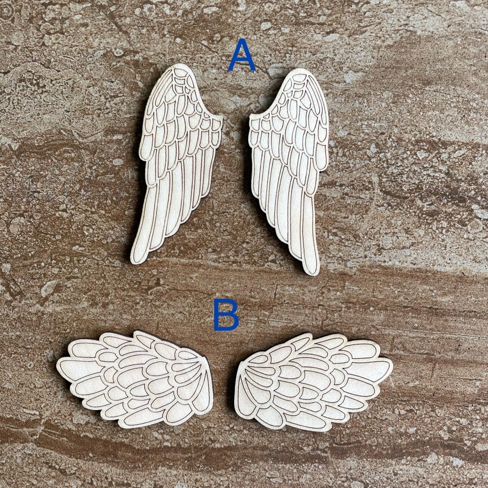 Handmade wooden DIY angel wing cutout in two unique styles, ready for paint or decorating