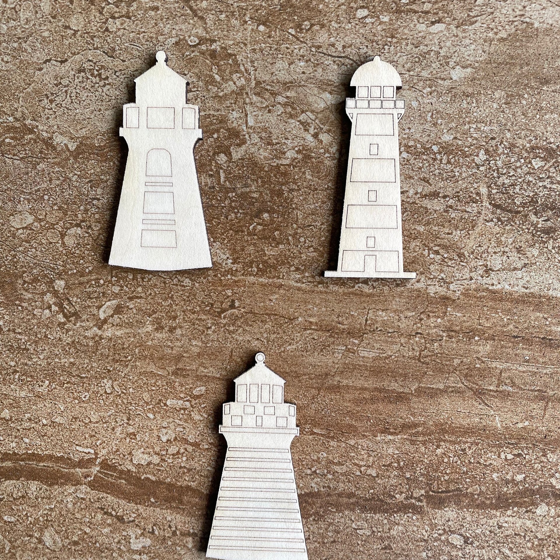 Handmade wooden DIY lighthouse cutout in three unique styles, ready for paint or decorating