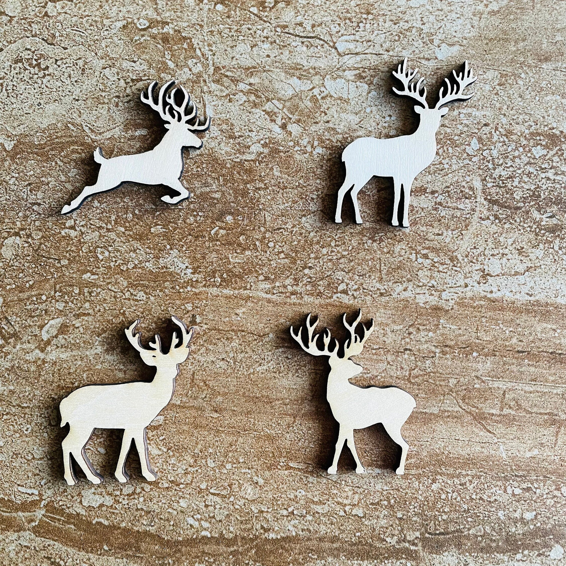 Handmade wooden DIY deer cutout in four unique styles, ready to paint or decorate