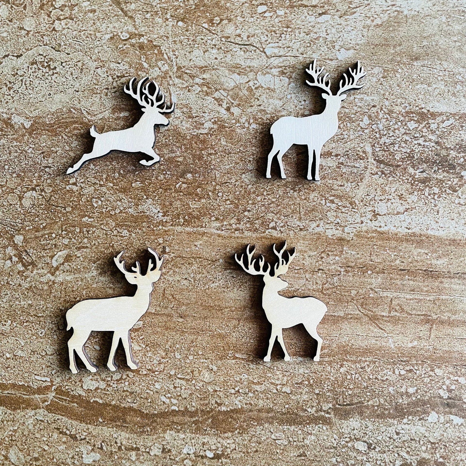 Handmade wooden DIY deer cutout in four unique styles, ready to paint or decorate