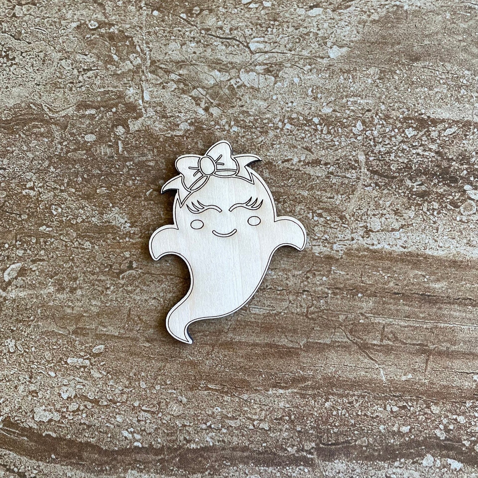 Handmade wooden DIY ghost cutout ready for paint or decorating