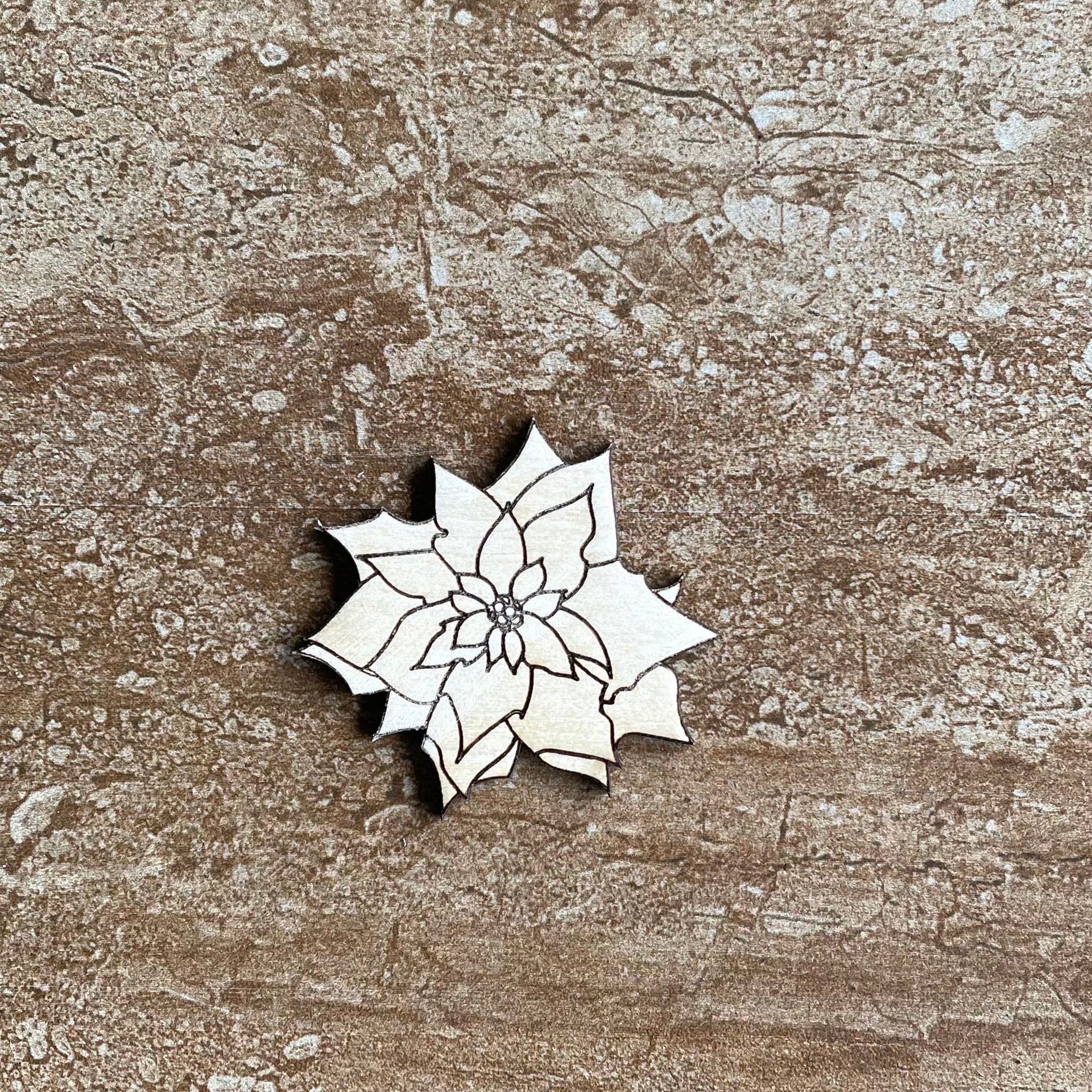 Handmade wooden DIY poinsettia cutout ready for paint or decorating