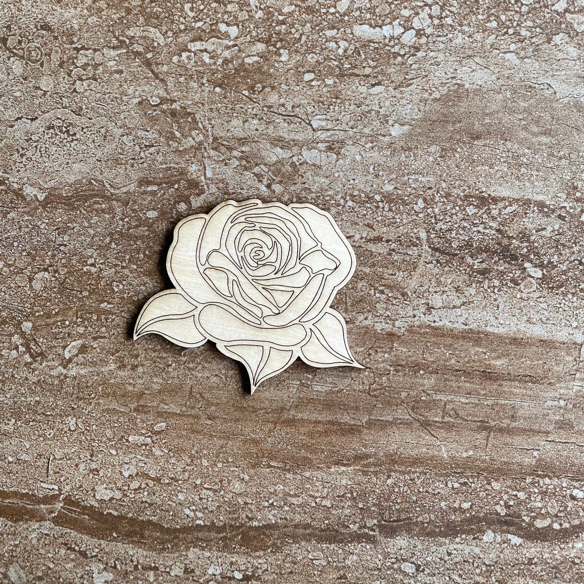 Handmade wooden DIY rose cutout ready for paint or decorations
