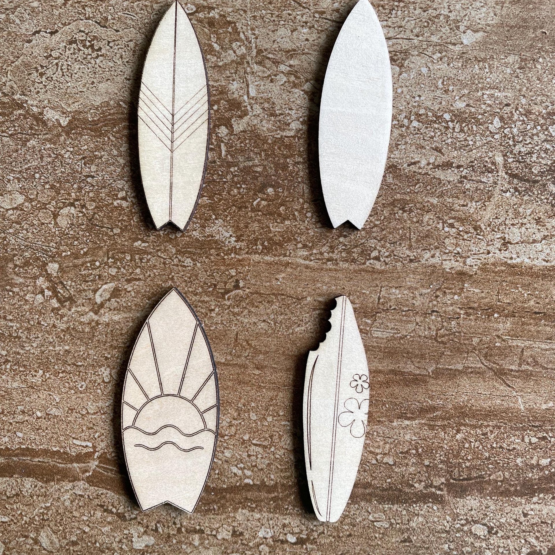 Handmade wooden DIY surfboard cutout in four unique styles, ready for paint or decorating