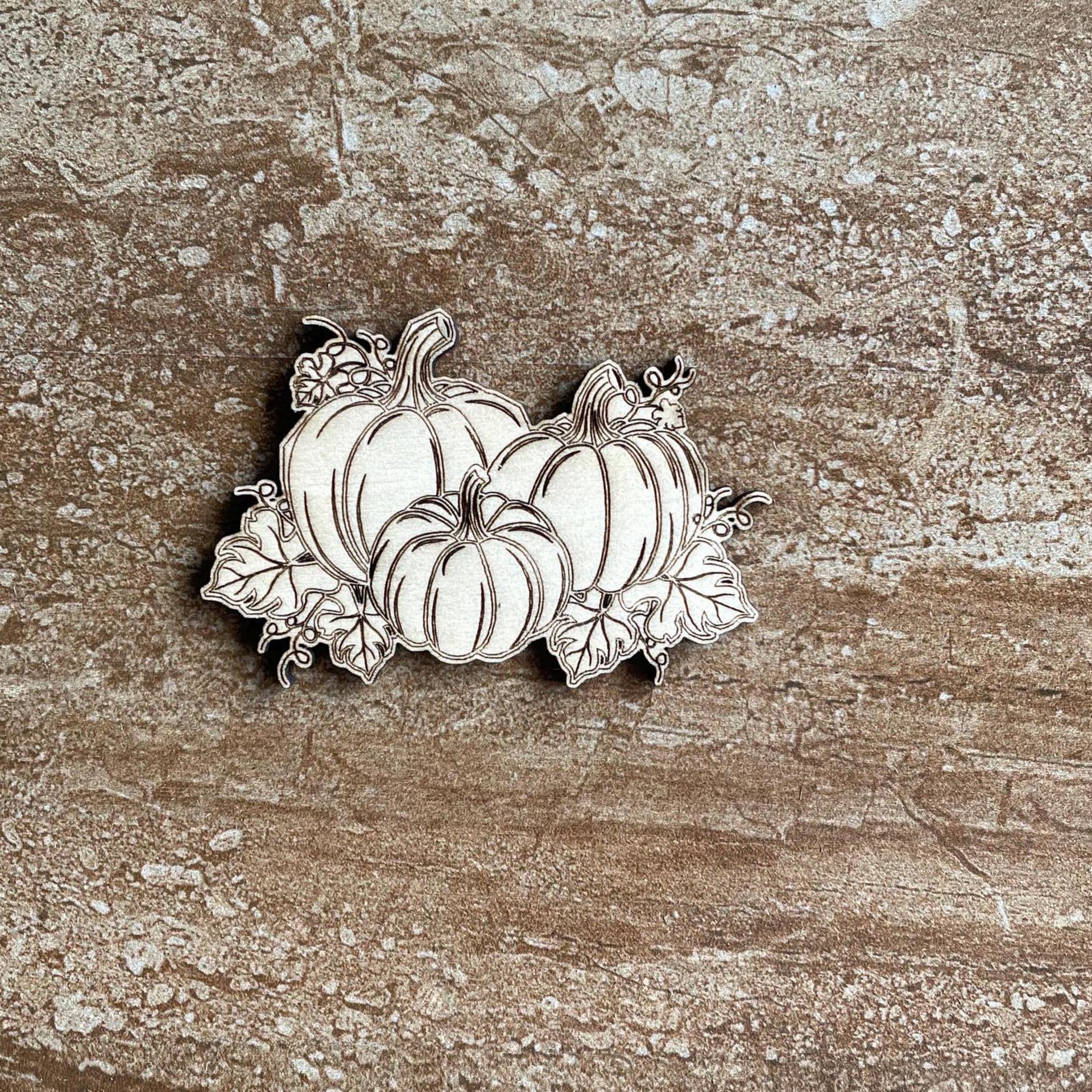 Handmade wooden DIY pumpkin cutout ready for paint or decorating