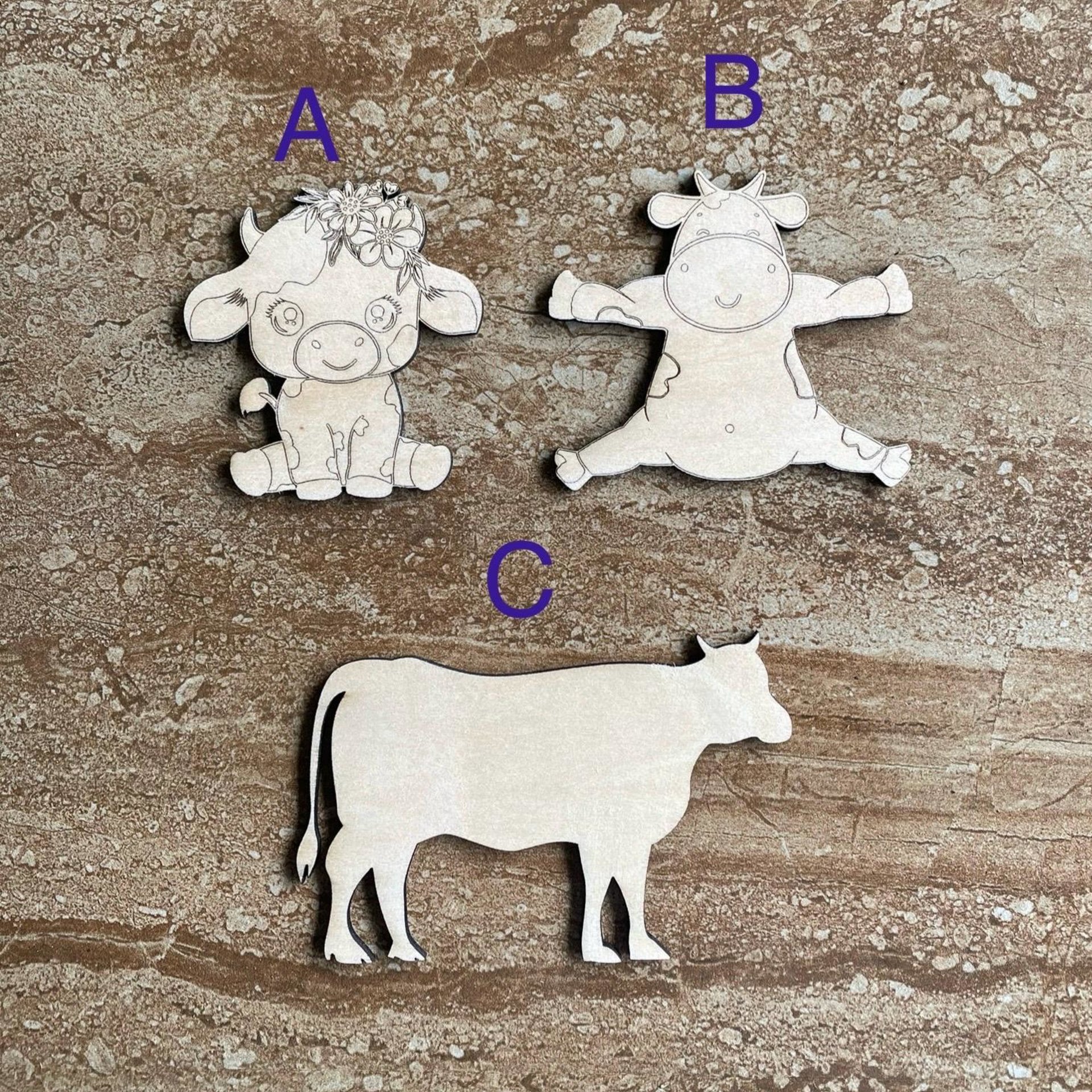 Handmade wooden DIY cow cutout in three unique styles, ready to paint or decorate