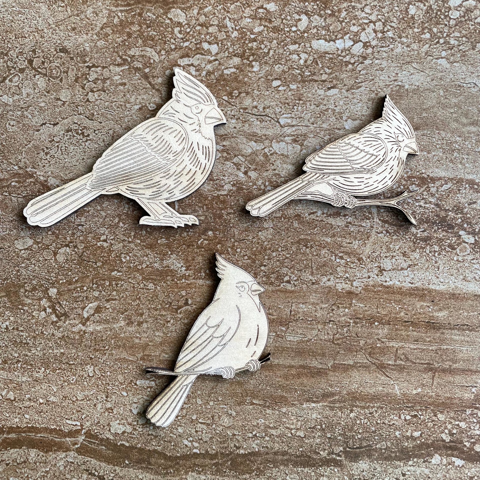 Handmade wooden DIY cardinal cutout in three unique styles, ready to paint or decorate