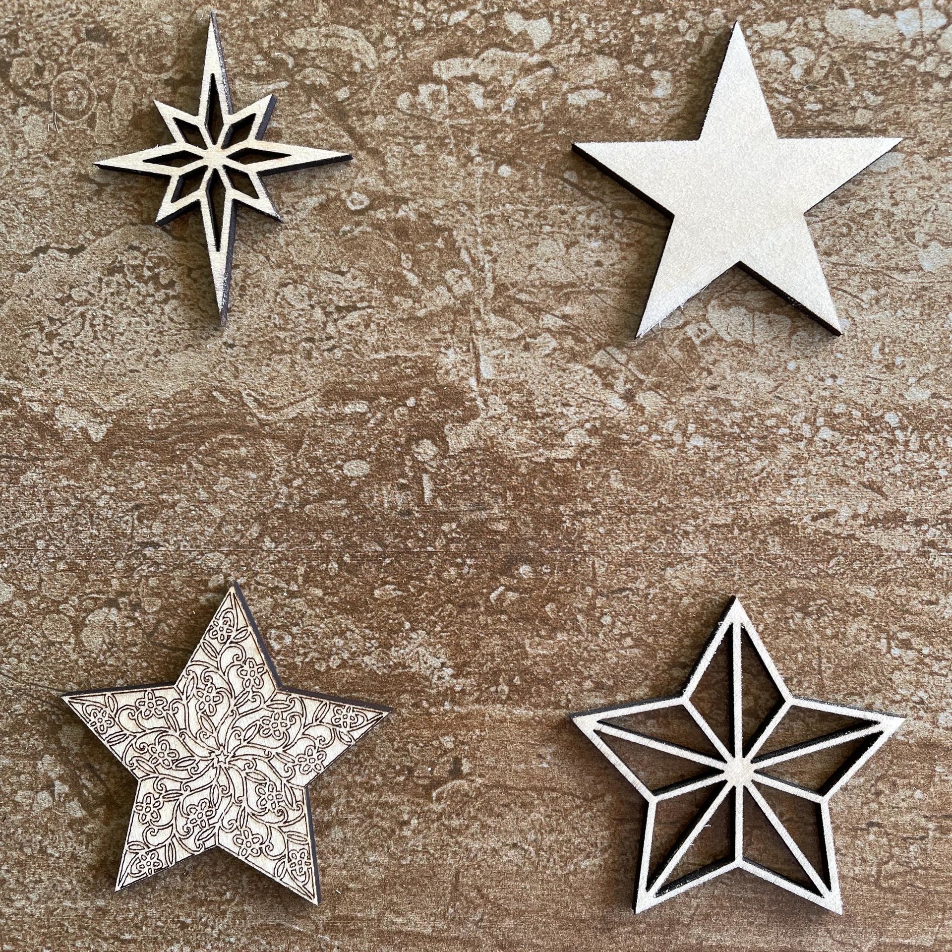 Handmade wooden DIY star cutout in four unique styles, ready for paint or decorating