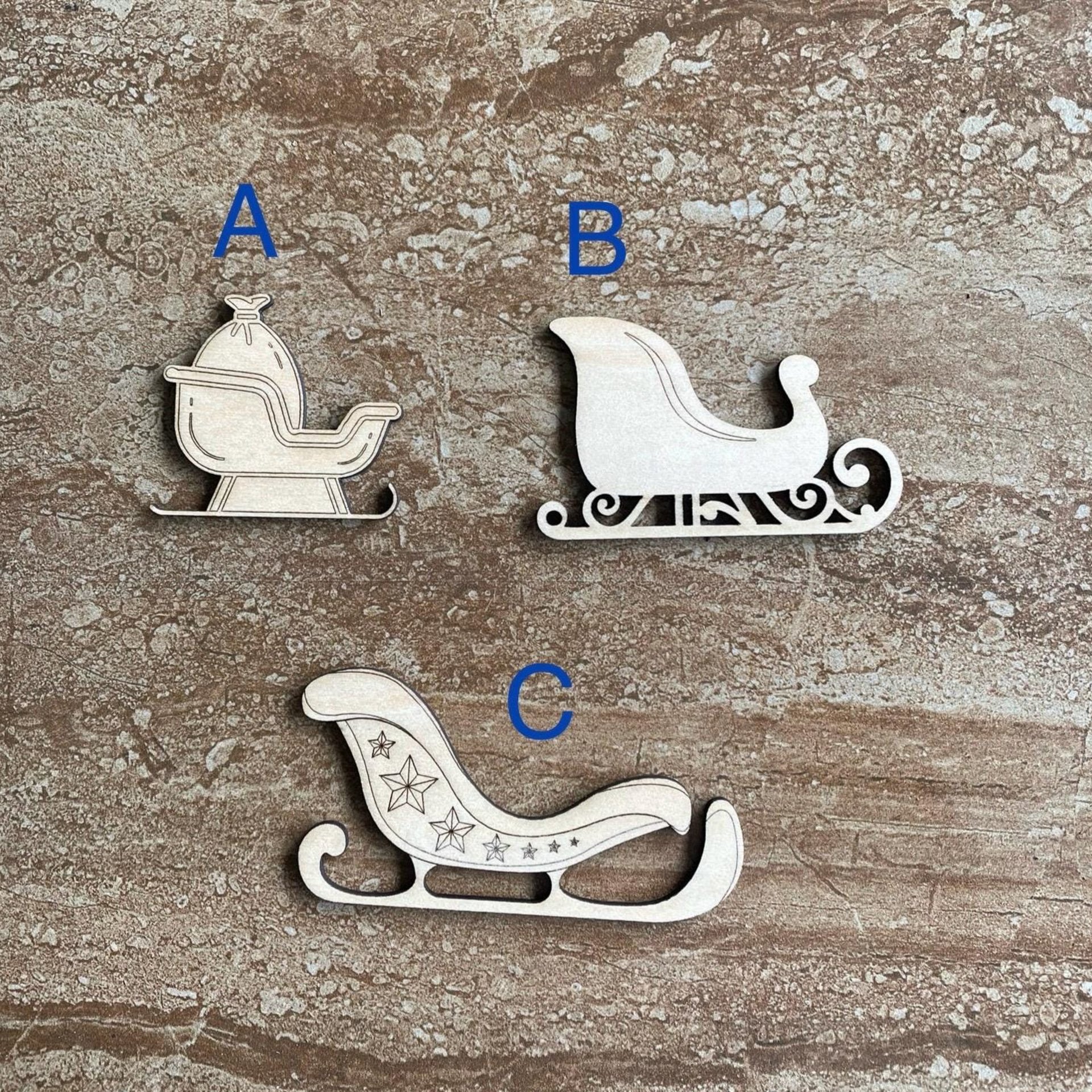 Handmade wooden DIY Christmas sleigh cutout in three unique styles, ready for paint or decorating