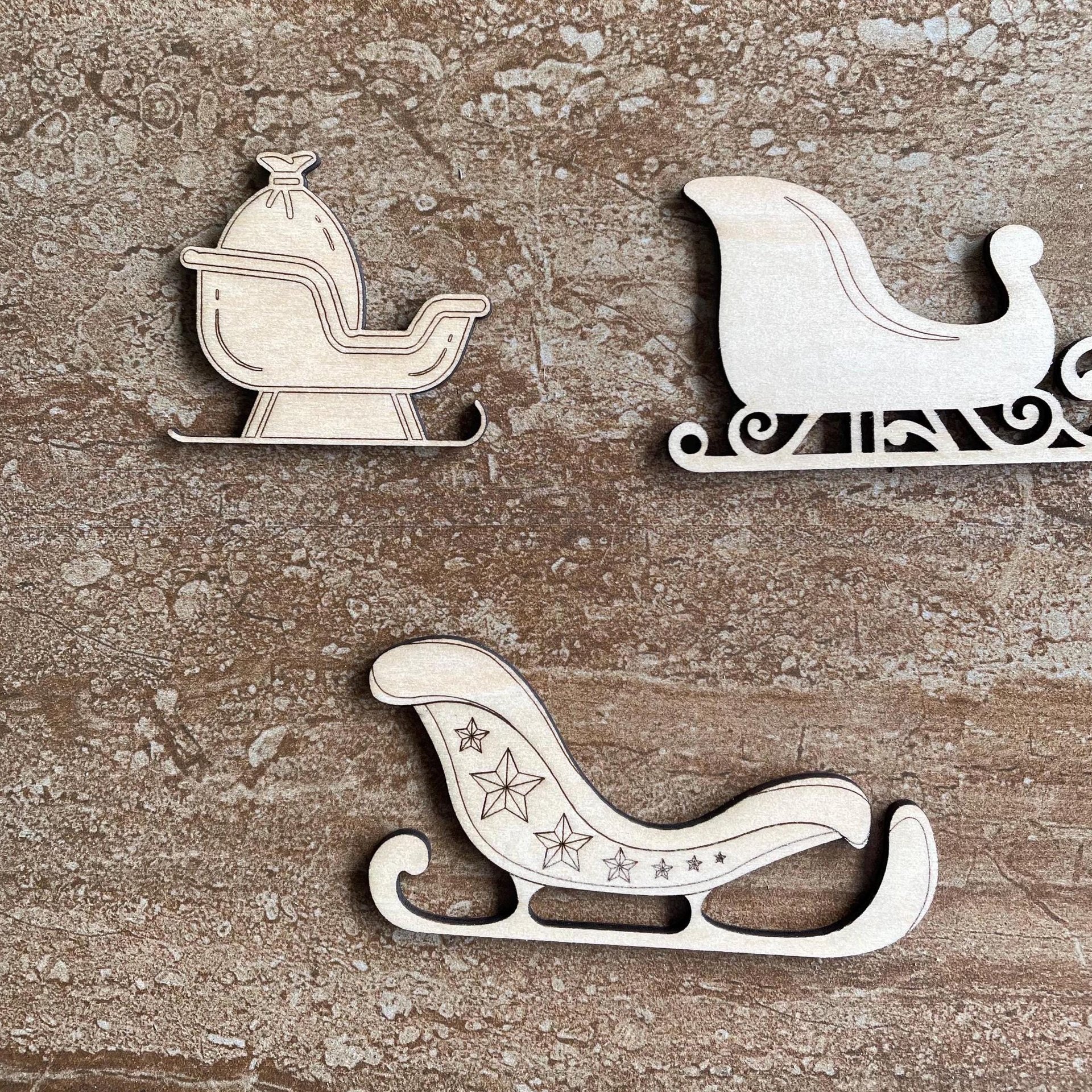 Handmade wooden DIY Christmas sleigh cutout in three unique styles, ready for paint or decorating