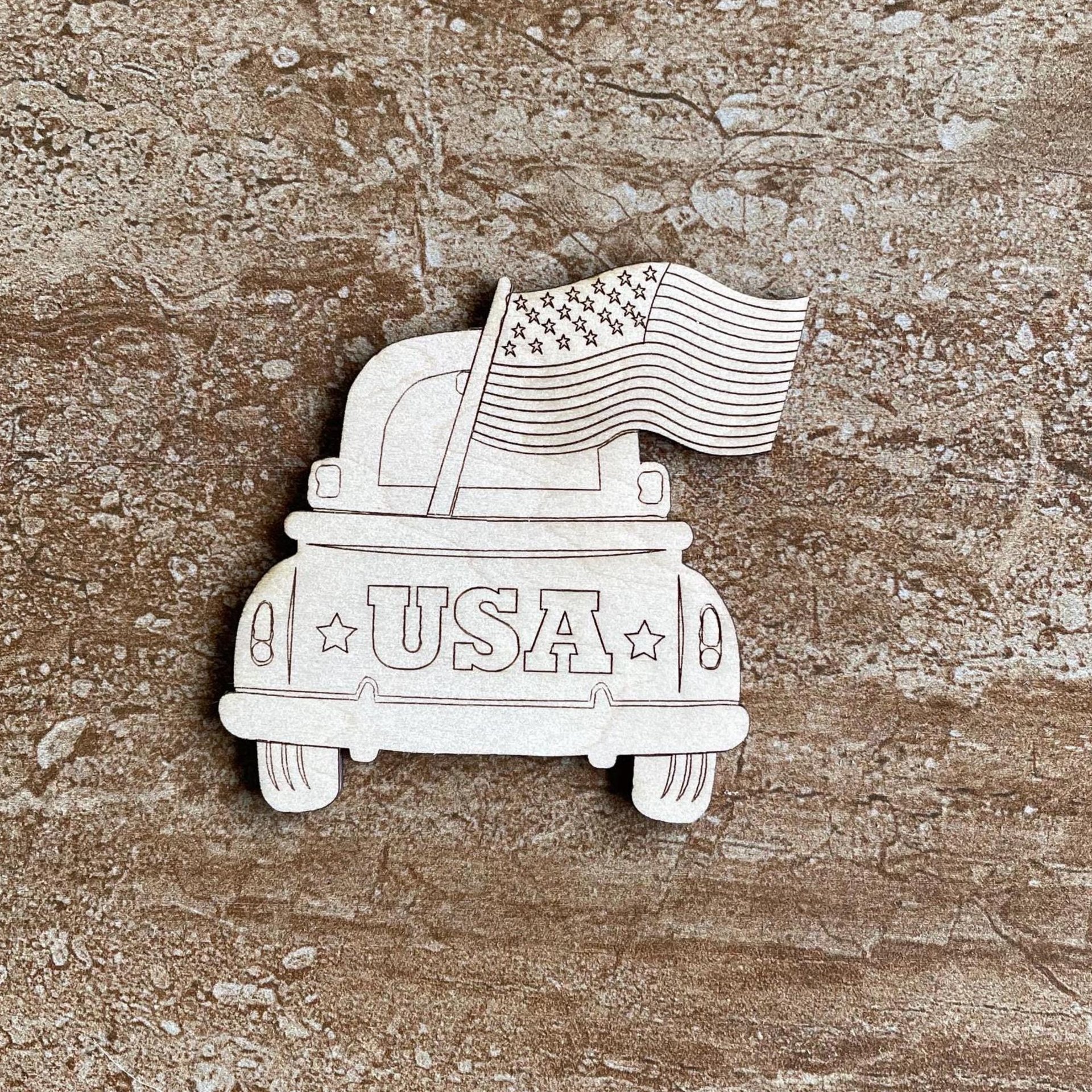 Handmade wooden DIY vintage truck with American flag cutout ready for paint or decorating