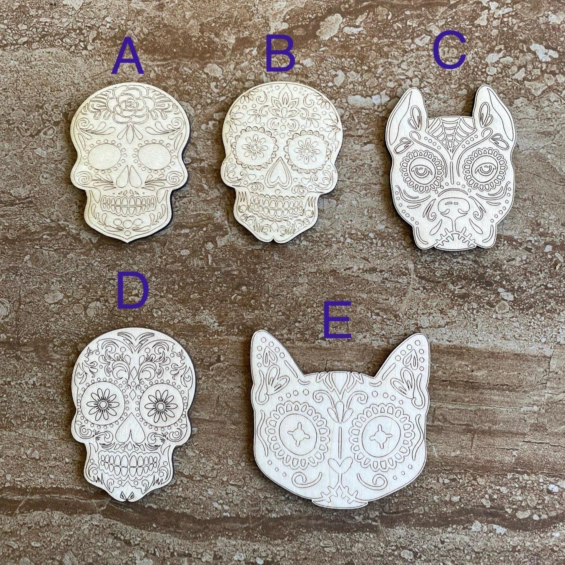 Handmade wooden DIY sugar skull cutout in five unique styles, ready for paint or decorating
