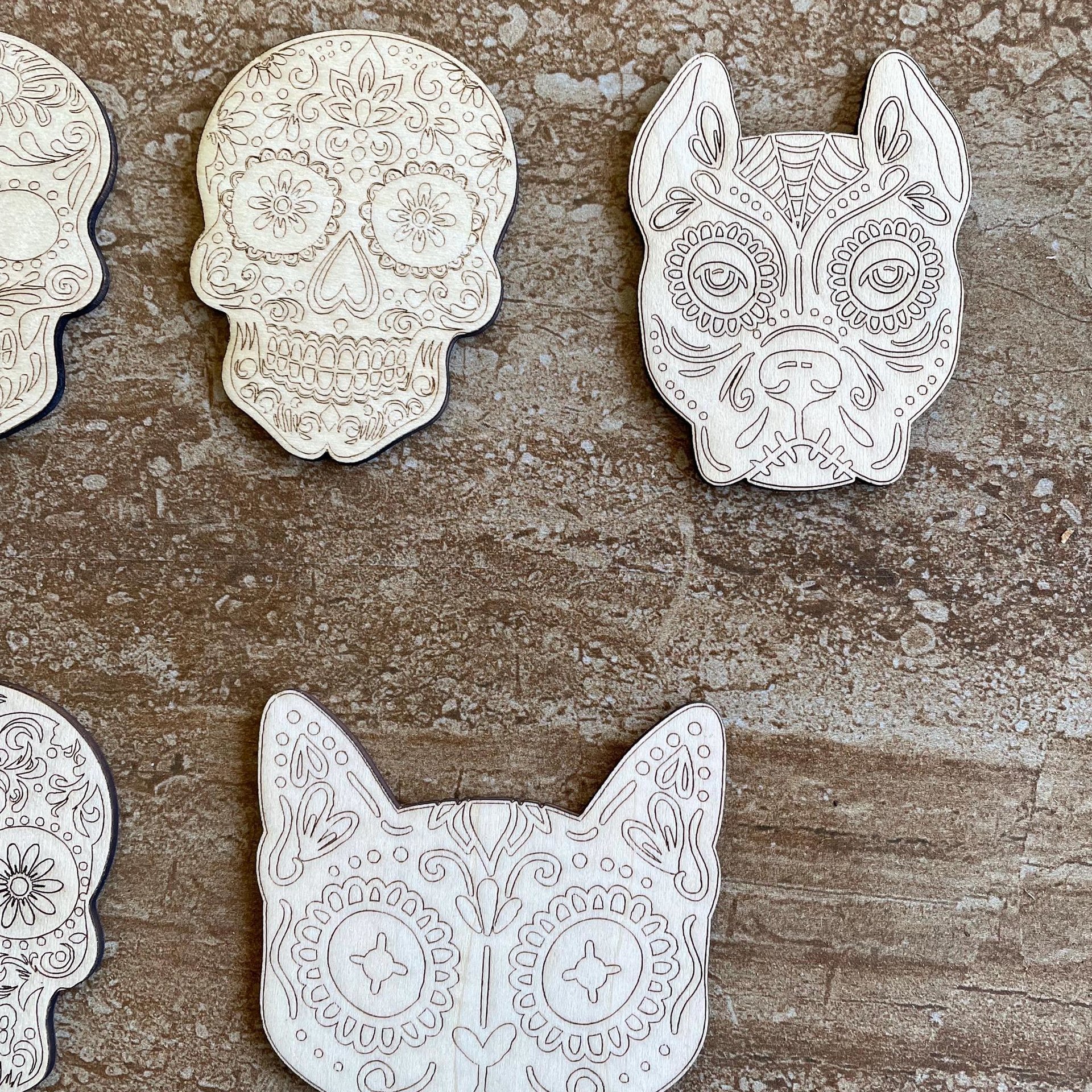 Handmade wooden DIY sugar skull cutout in five unique styles, ready for paint or decorating