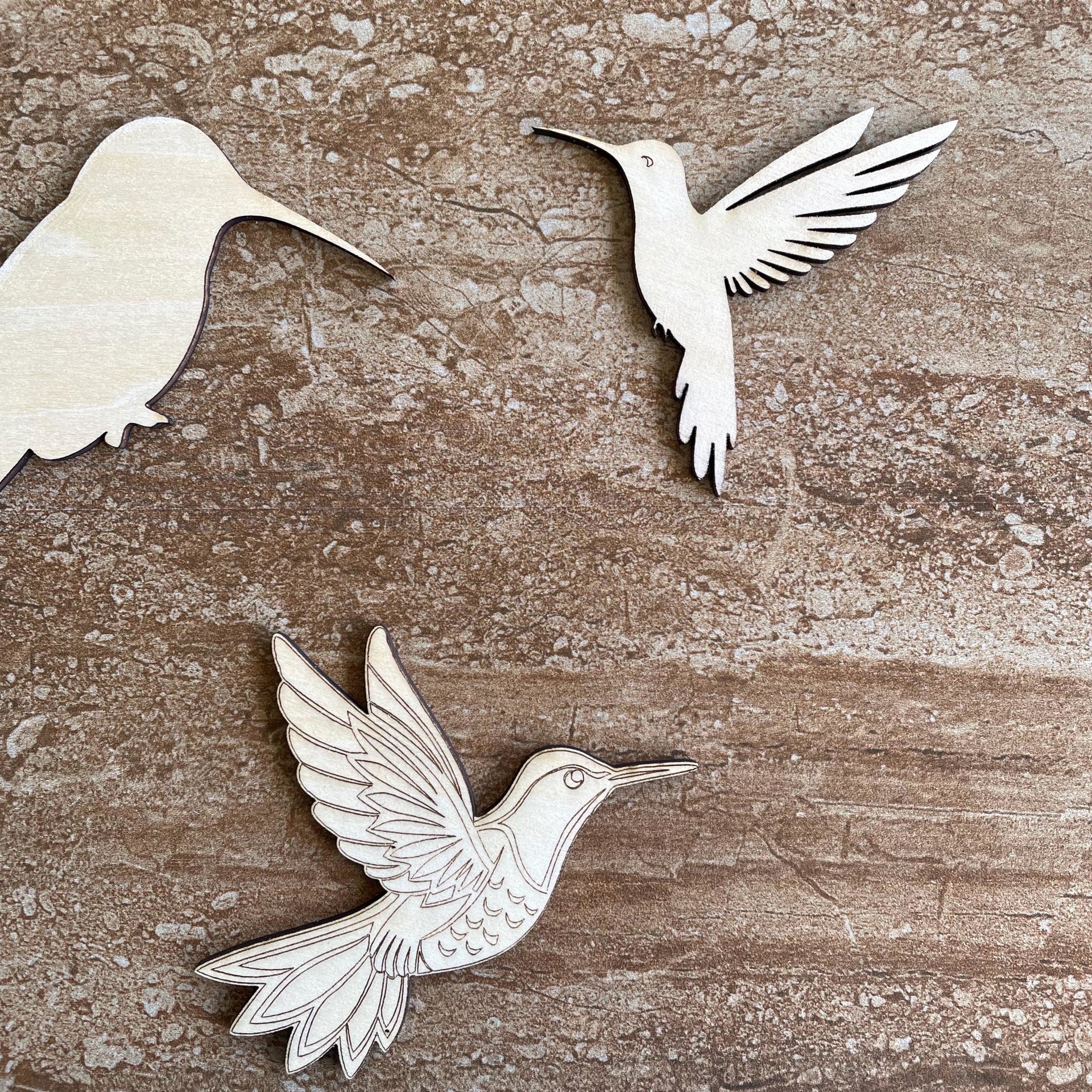 Handmade wooden DIY hummingbird cutout in three unique styles, ready to paint or decorate