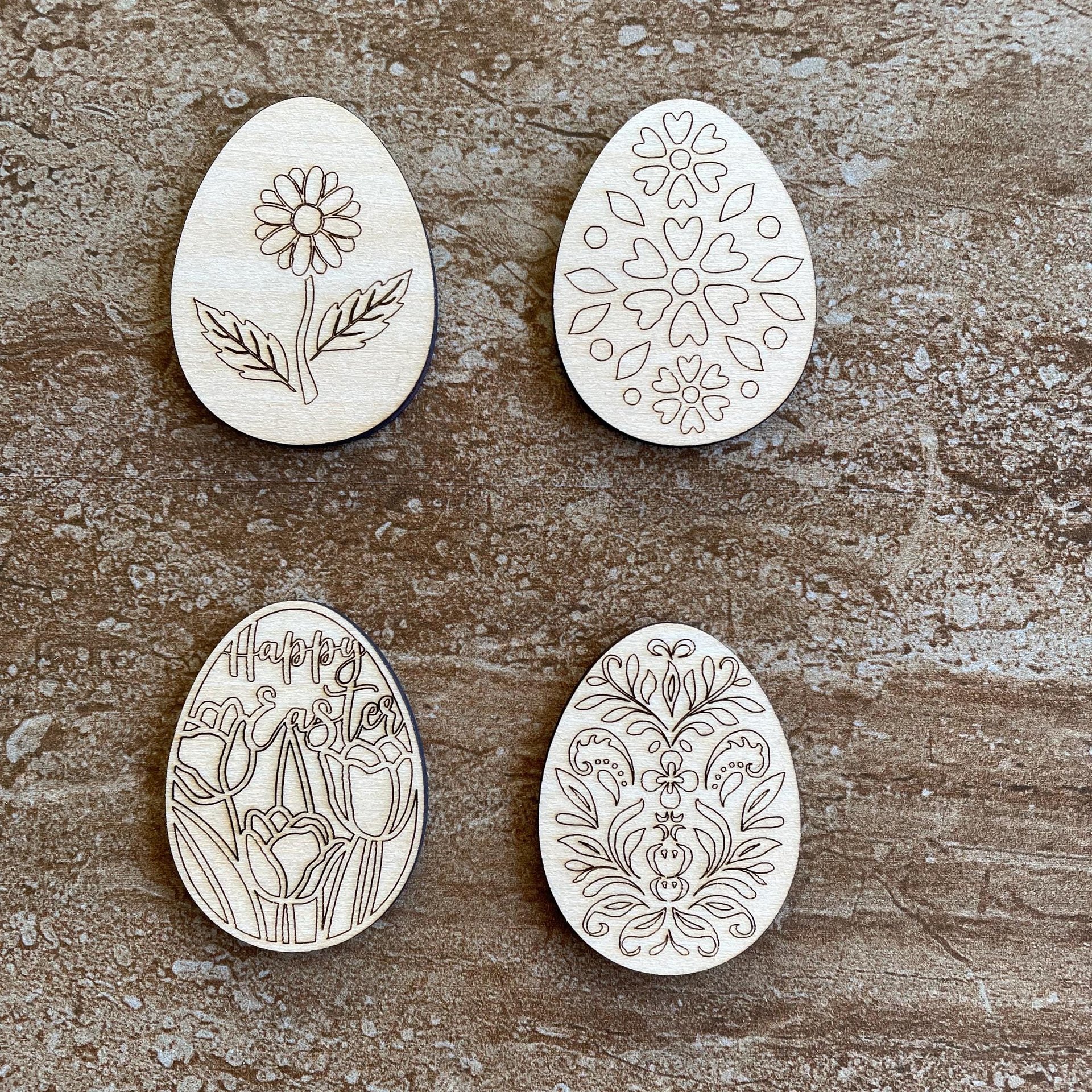 Handmade wooden DIY Easter egg cutout in four unique styles, ready for paint or decorating