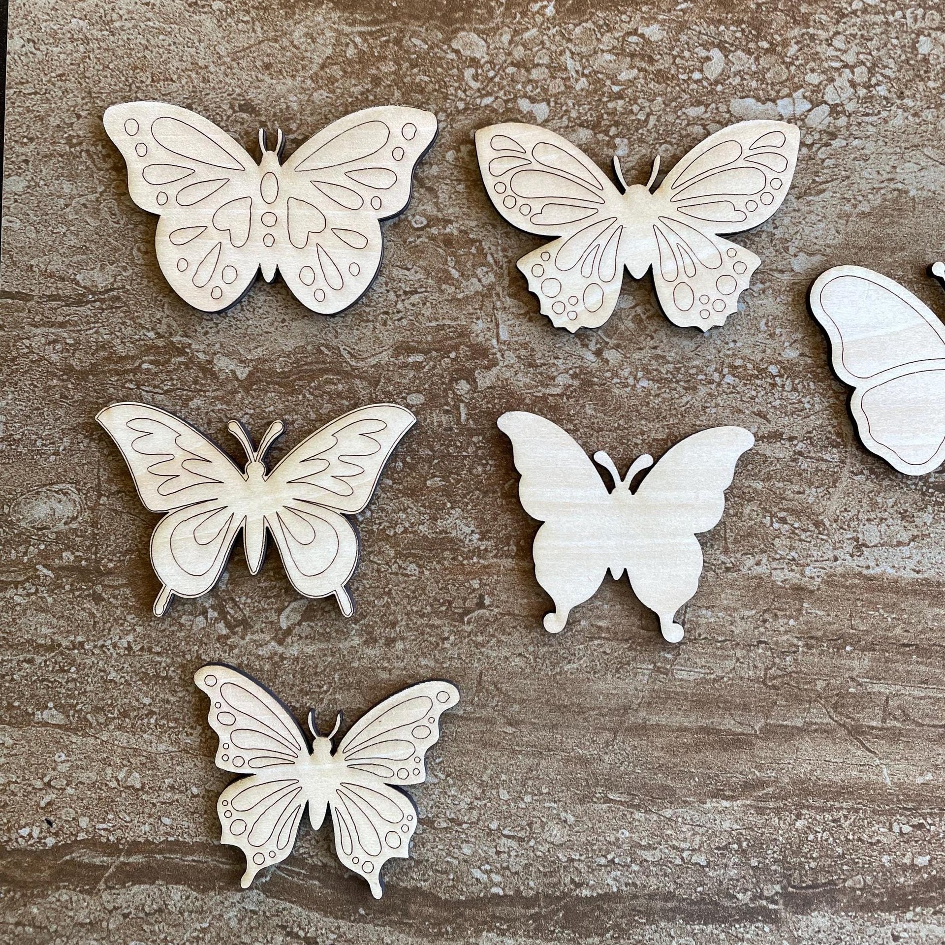Handmade wooden DIY butterfly cutout in six unique styles, ready to paint or decorate