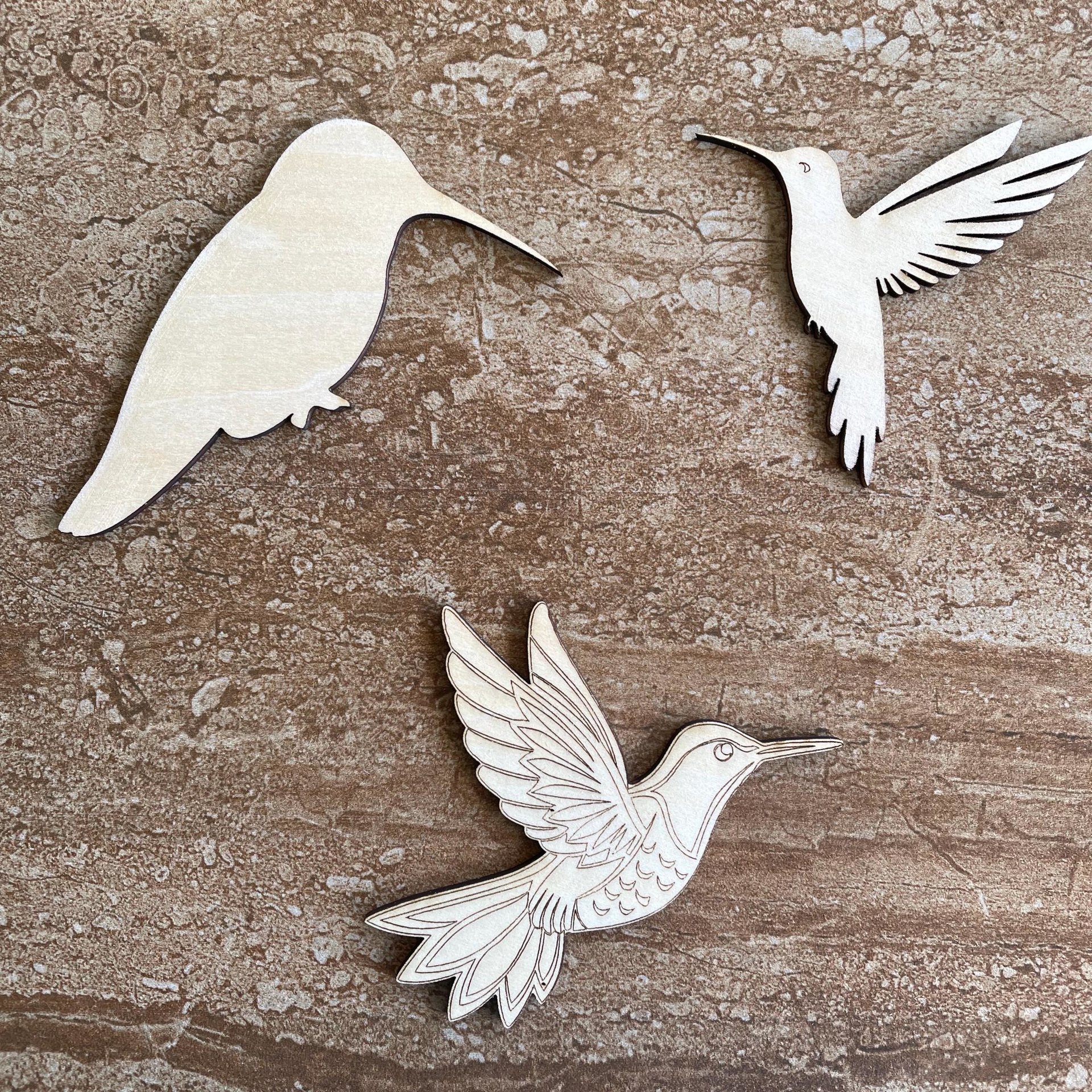 Handmade wooden DIY hummingbird cutout in three unique styles, ready to paint or decorate