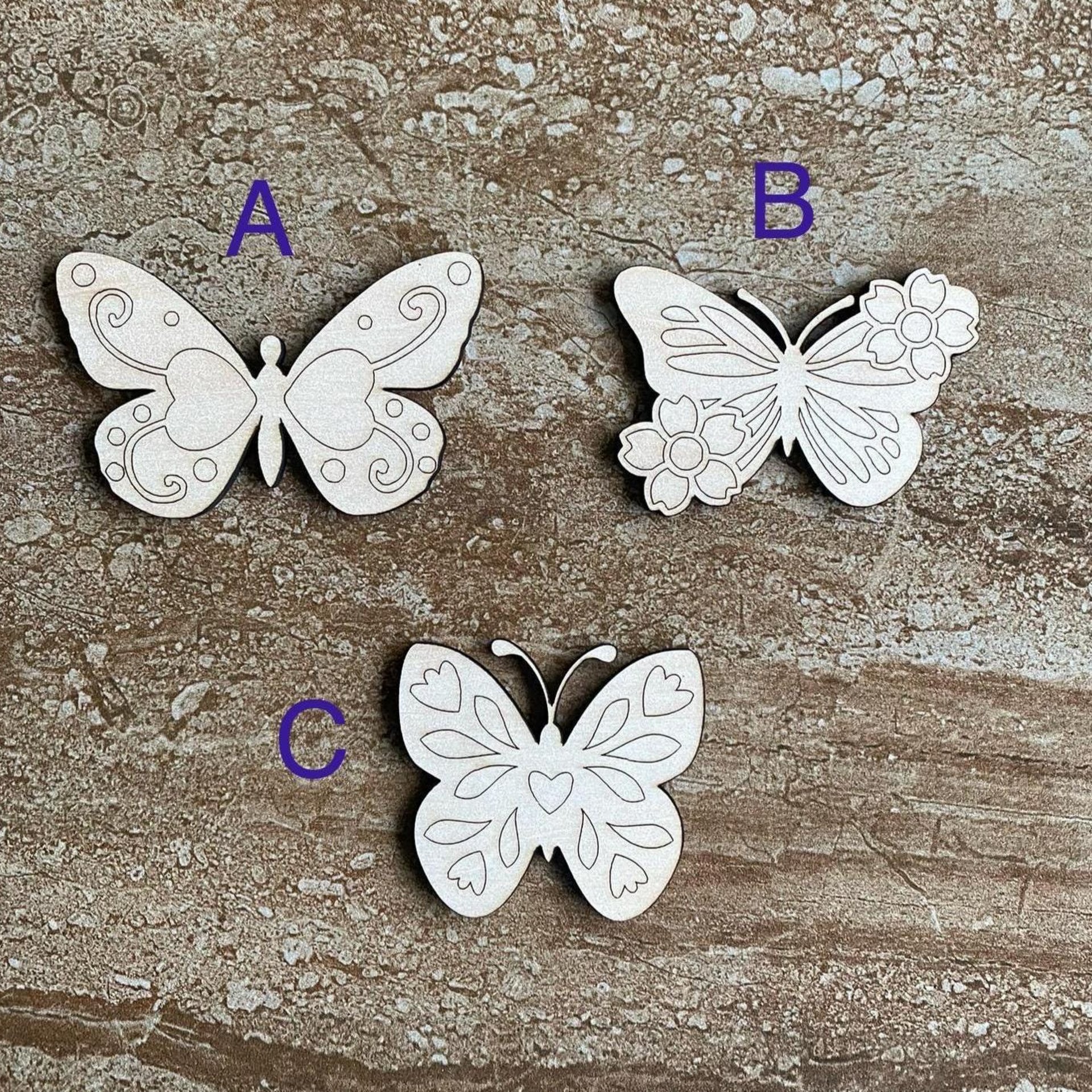 Handmade wooden DIY butterfly cutout in three unique styles, ready to paint or decorate