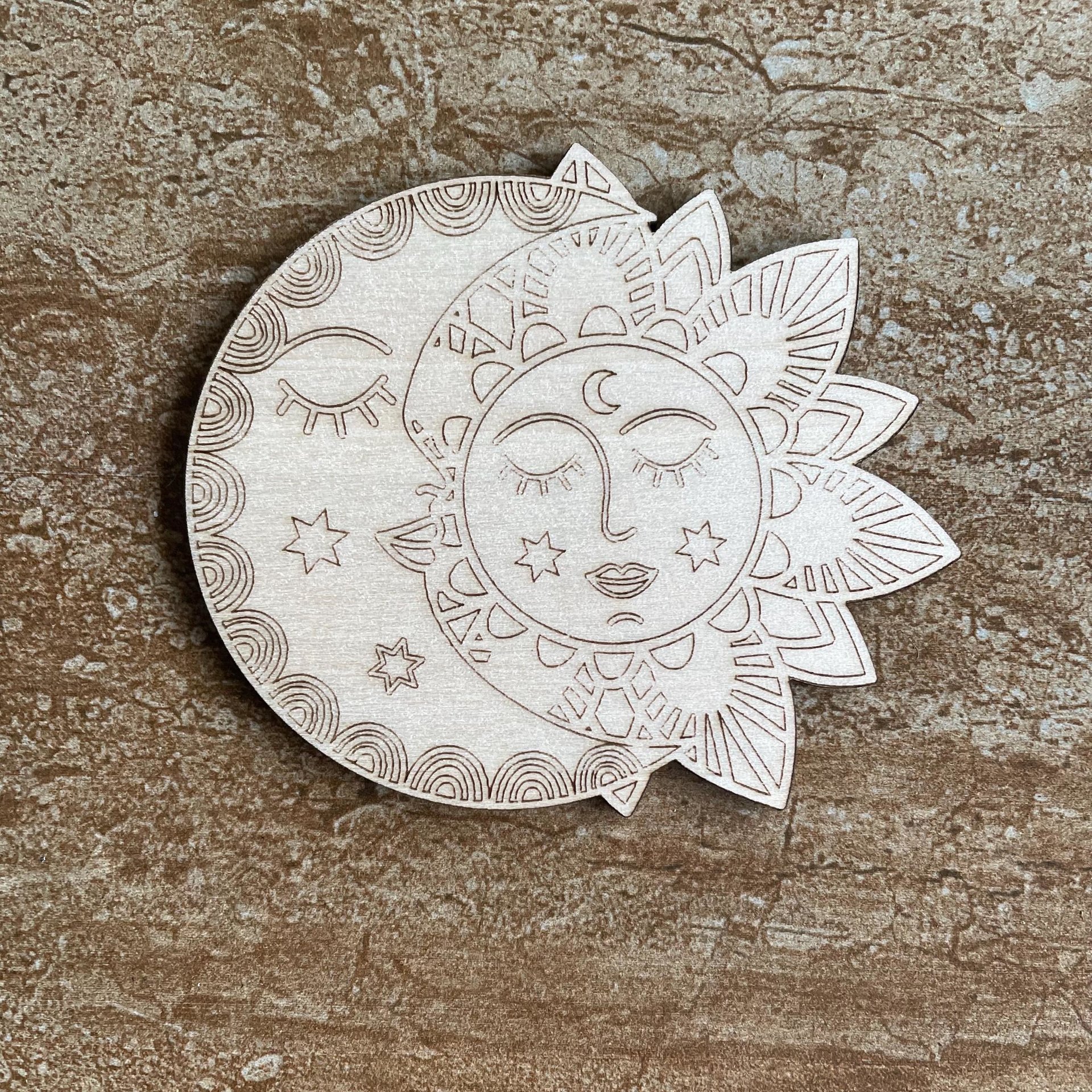 Handmade wooden DIY sun and moon cutout ready for paint or decorating