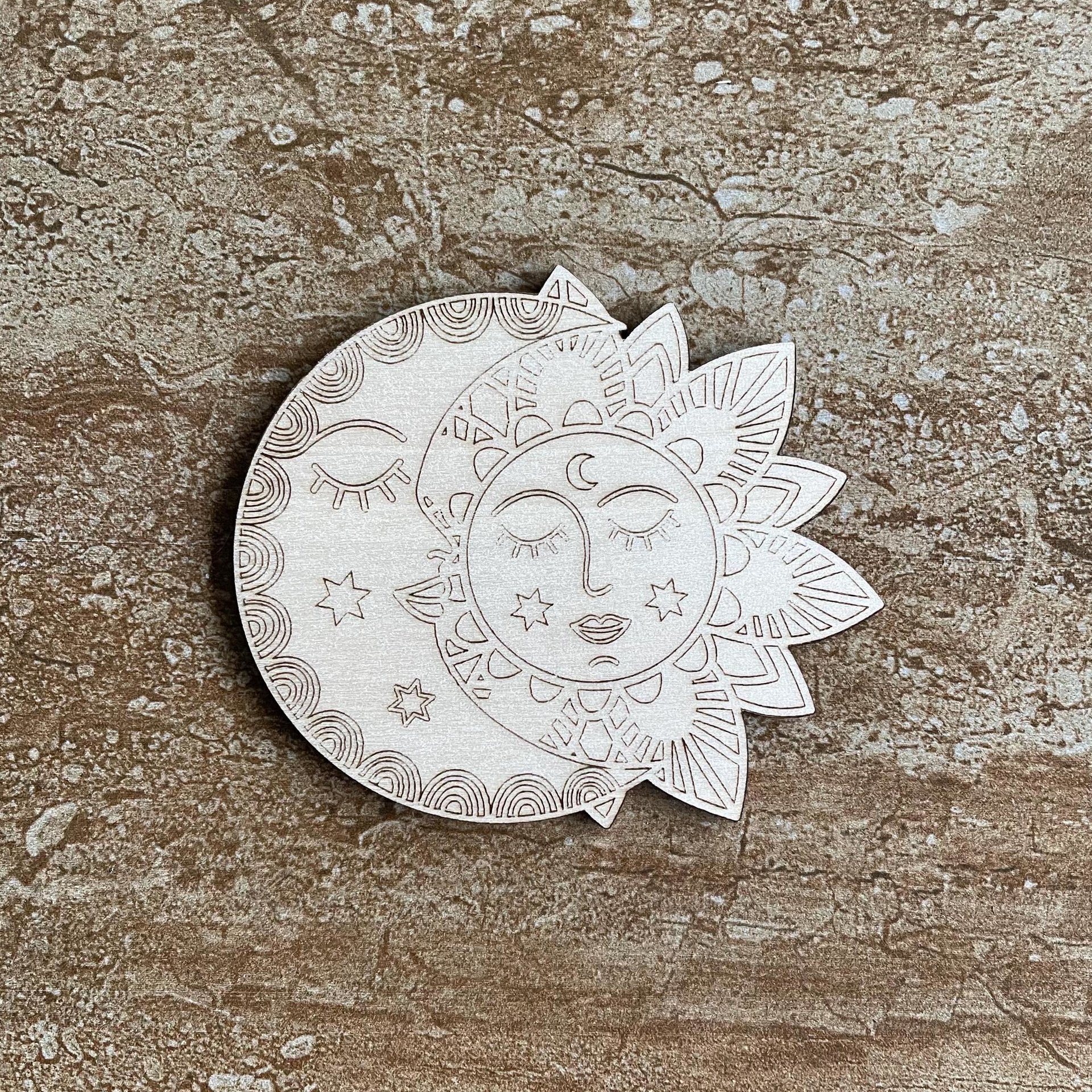 Handmade wooden DIY sun and moon cutout ready for paint or decorating