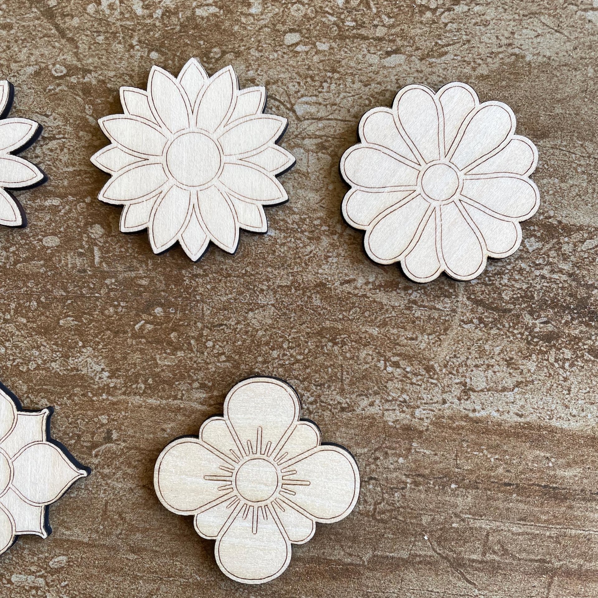 Handmade wooden DIY flower cutout in five unique styles, ready for paint or decorating