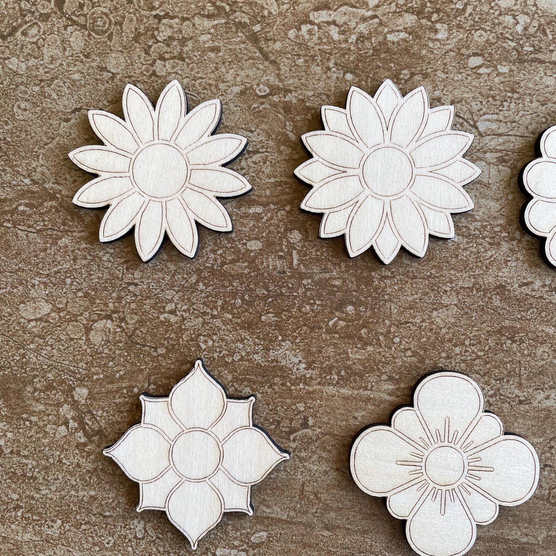 Handmade wooden DIY flower cutout in five unique styles, ready for paint or decorating