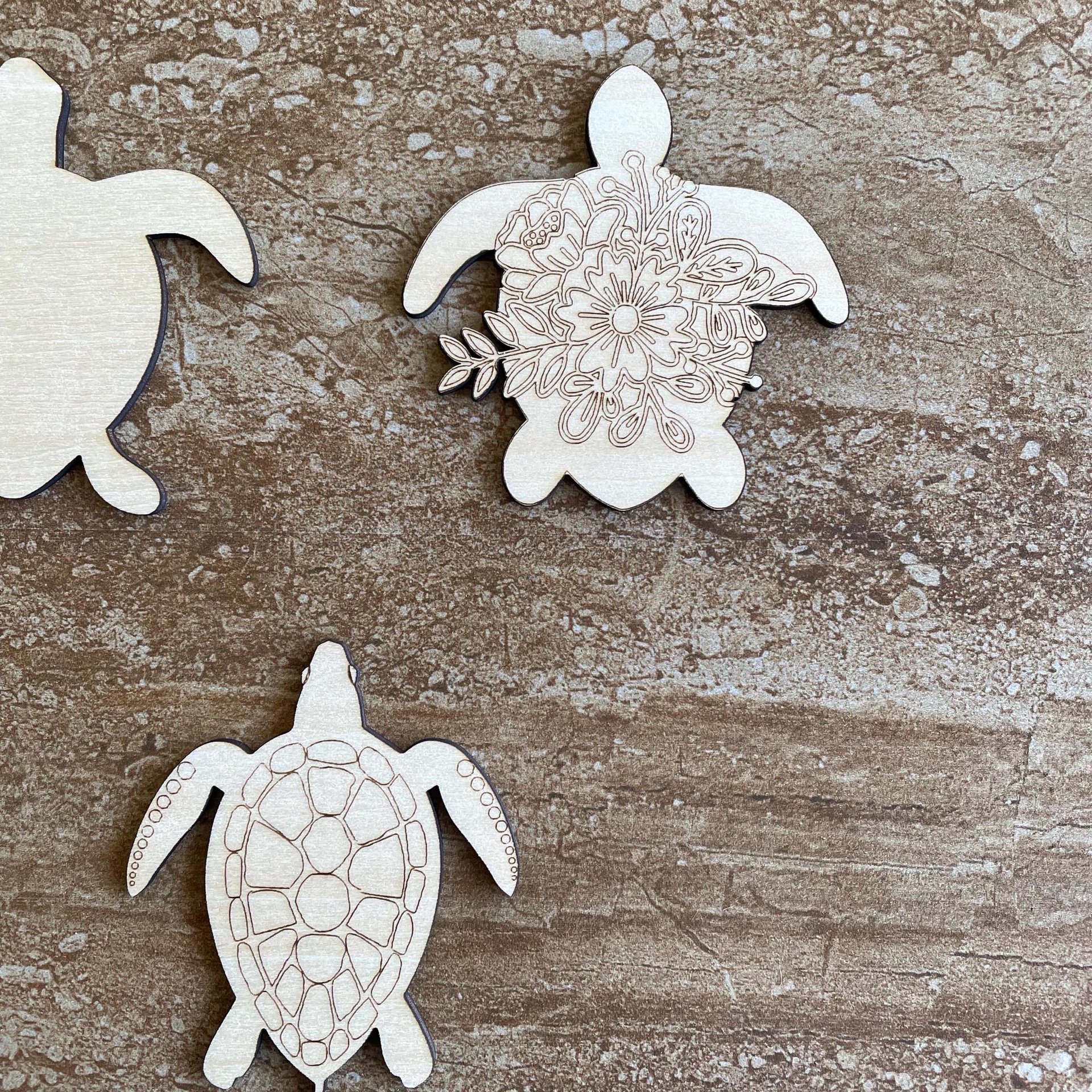 Handmade wooden DIY turtle cutout in three unique styles, ready for paint or decorating