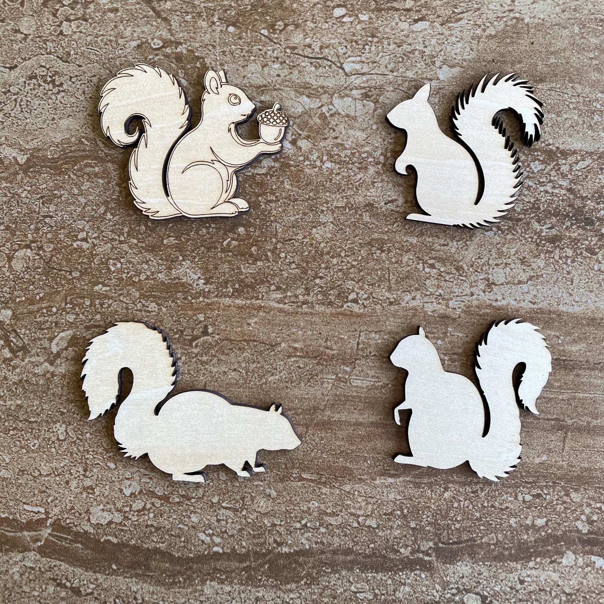 Handmade wooden DIY squirrel cutout in four unique styles, ready to paint or decorate