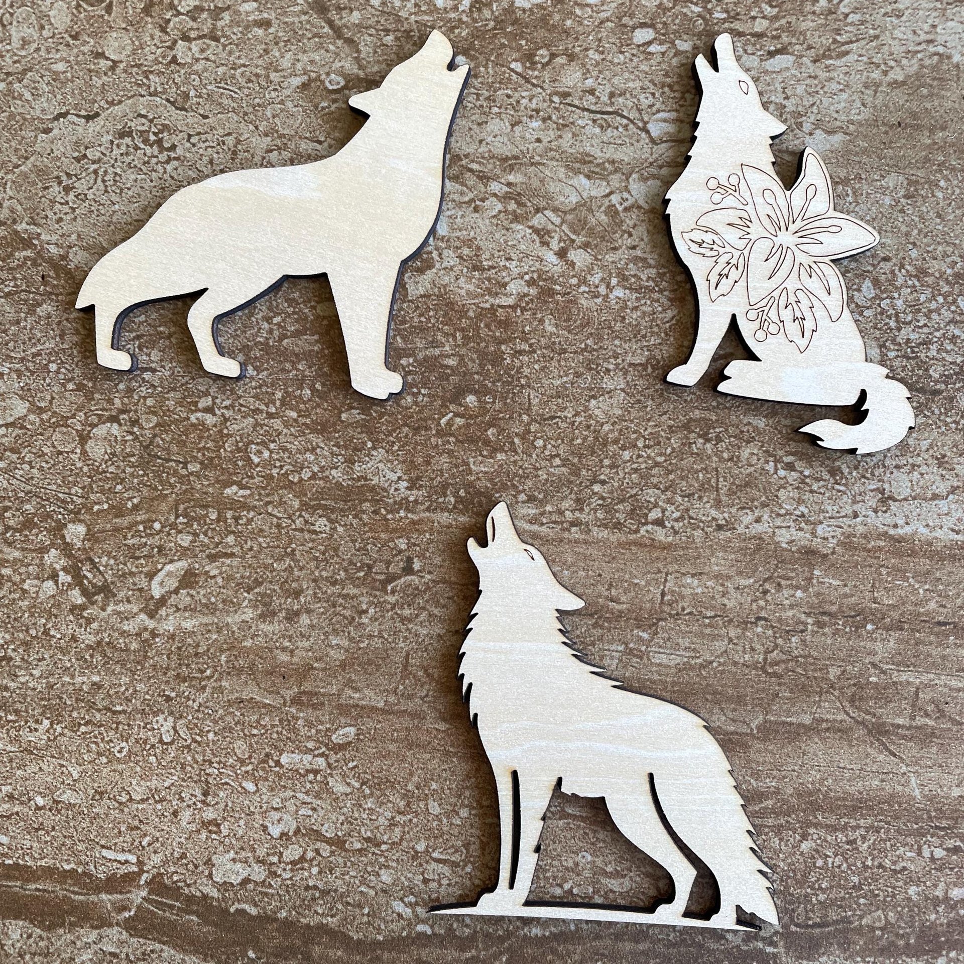 Handmade wooden DIY wolf cutout in three unique styles, ready to paint or decorate