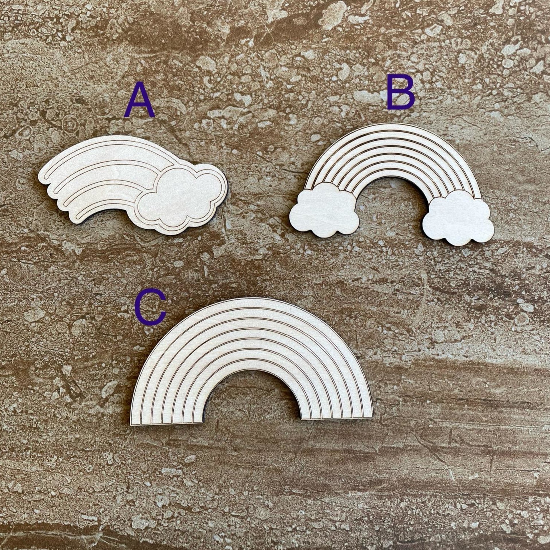 Handmade wooden DIY rainbow cutout in three unique styles, ready for paint or decorating