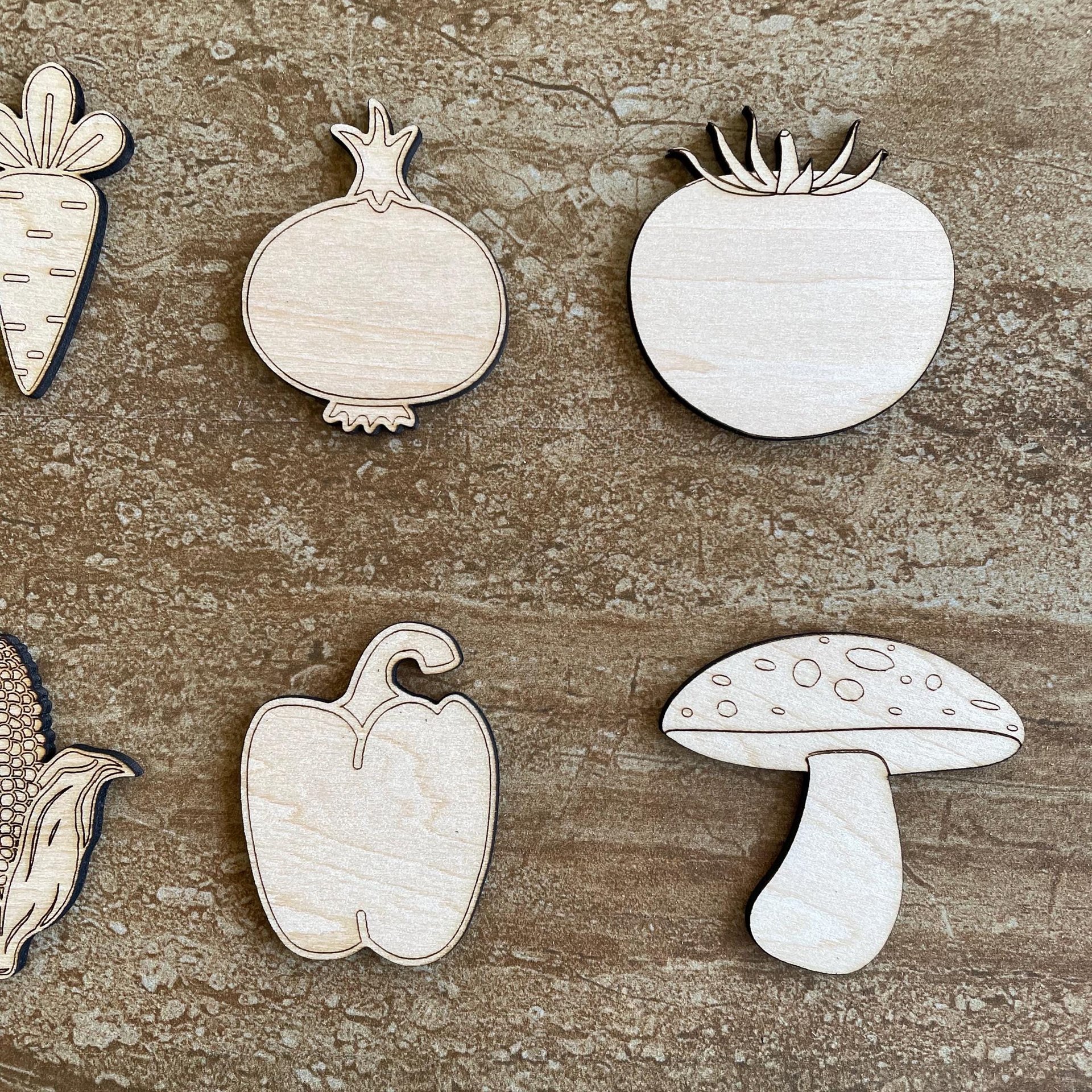 Handmade wooden DIY vegetable cutout in six unique styles, ready for paint or decorating