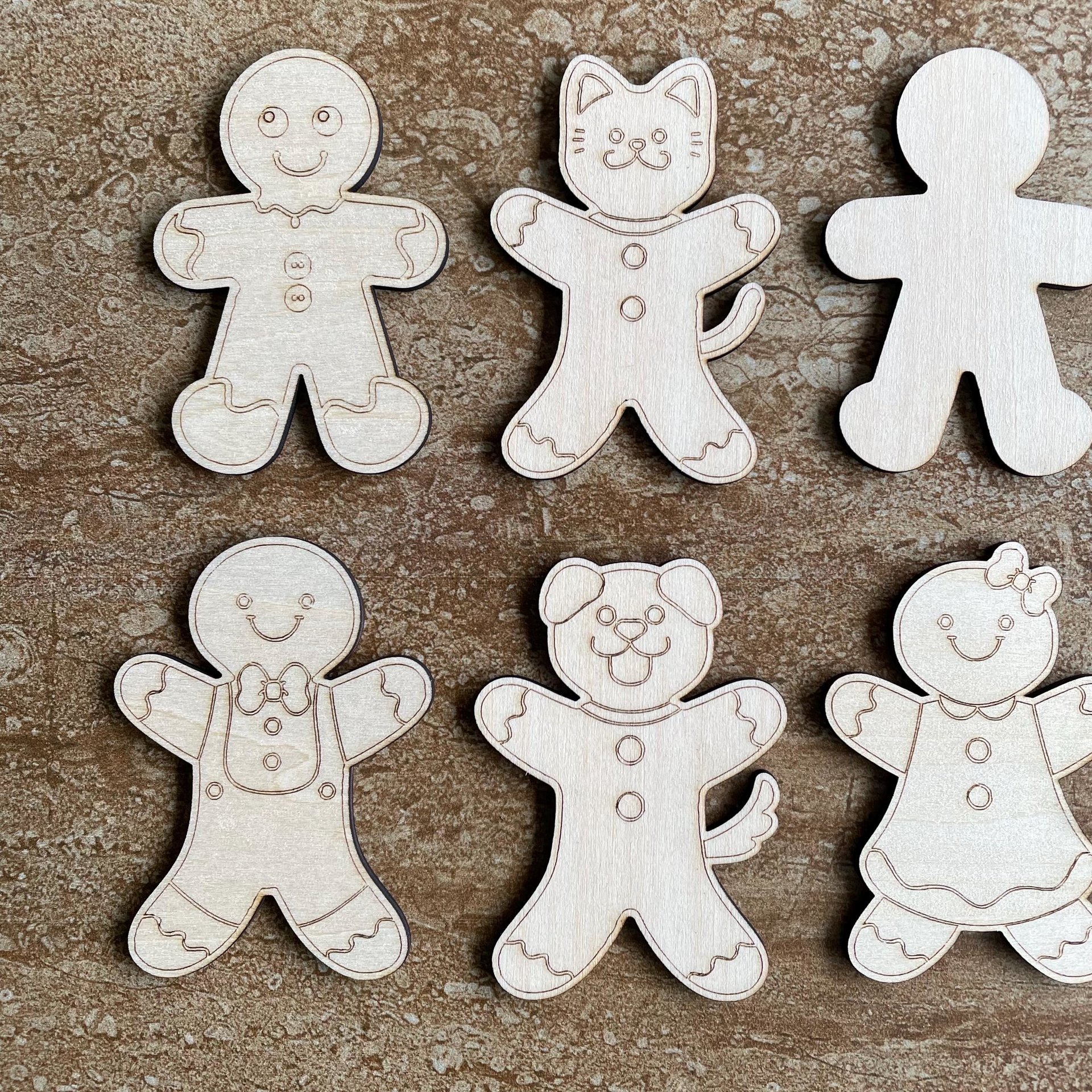 Handmade wooden DIY Gingerbread family cutout in six unique styles, ready for paint or decorating