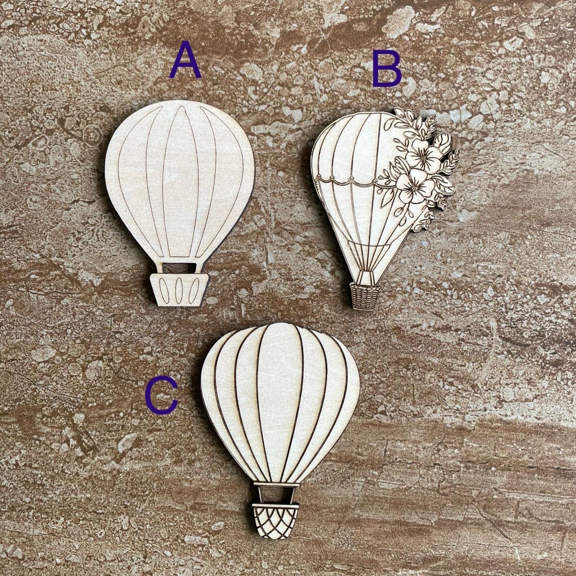 Handmade wooden DIY hot air balloon cutout in three unique styles, ready for paint or decorating