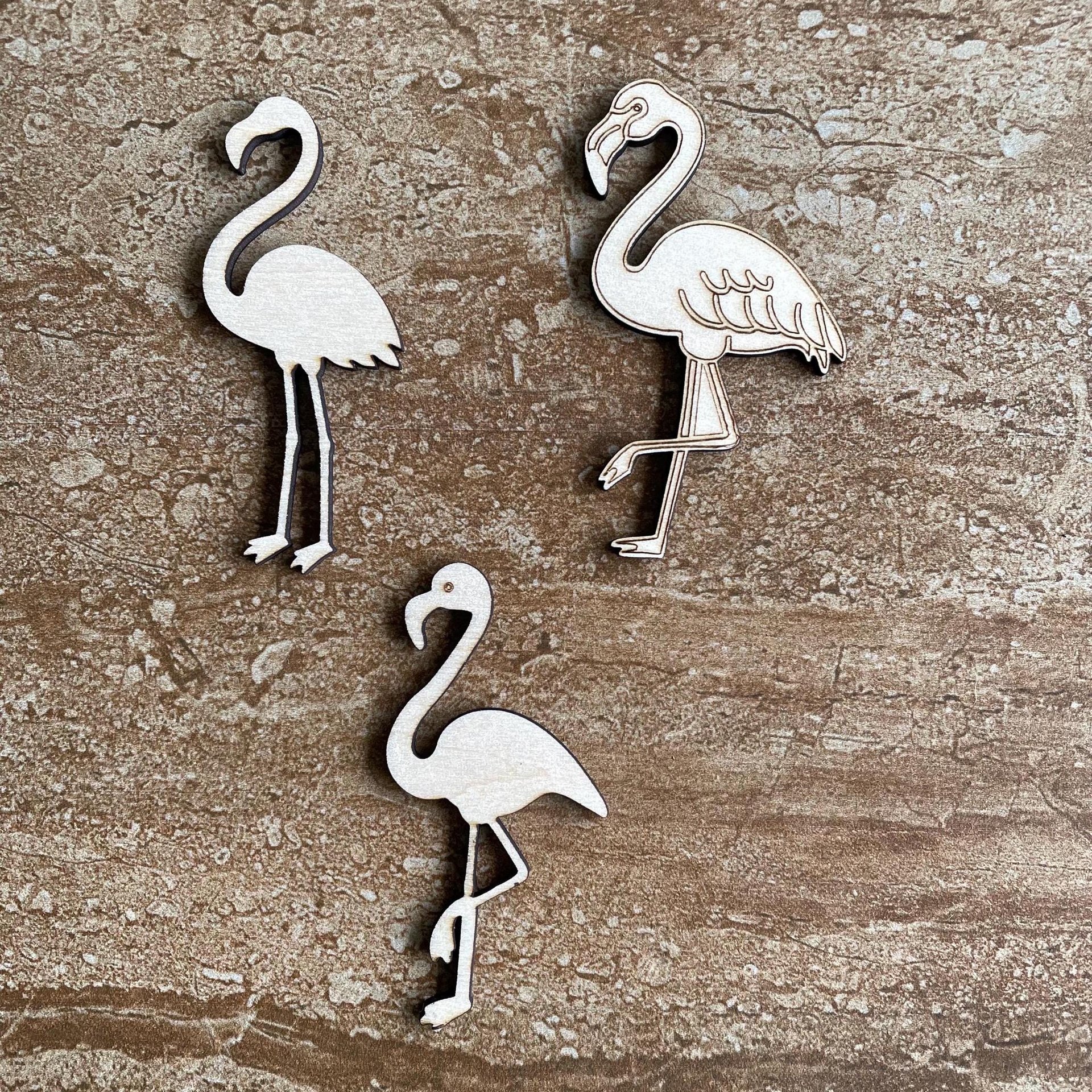 Handmade wooden DIY penguin cutout in three unique styles, ready to paint or decorate