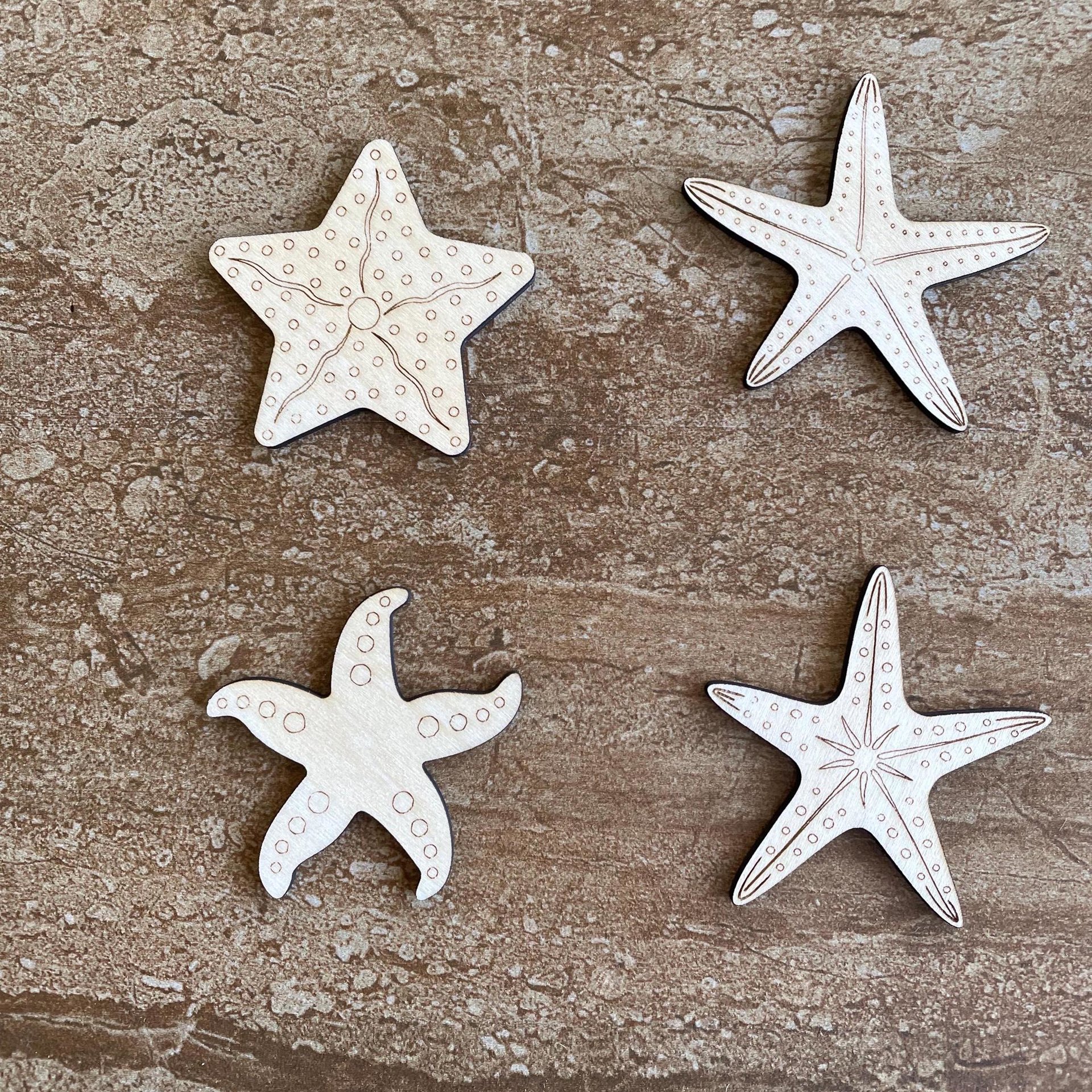 Handmade wooden DIY starfish cutout in four unique styles, ready for paint or decorating