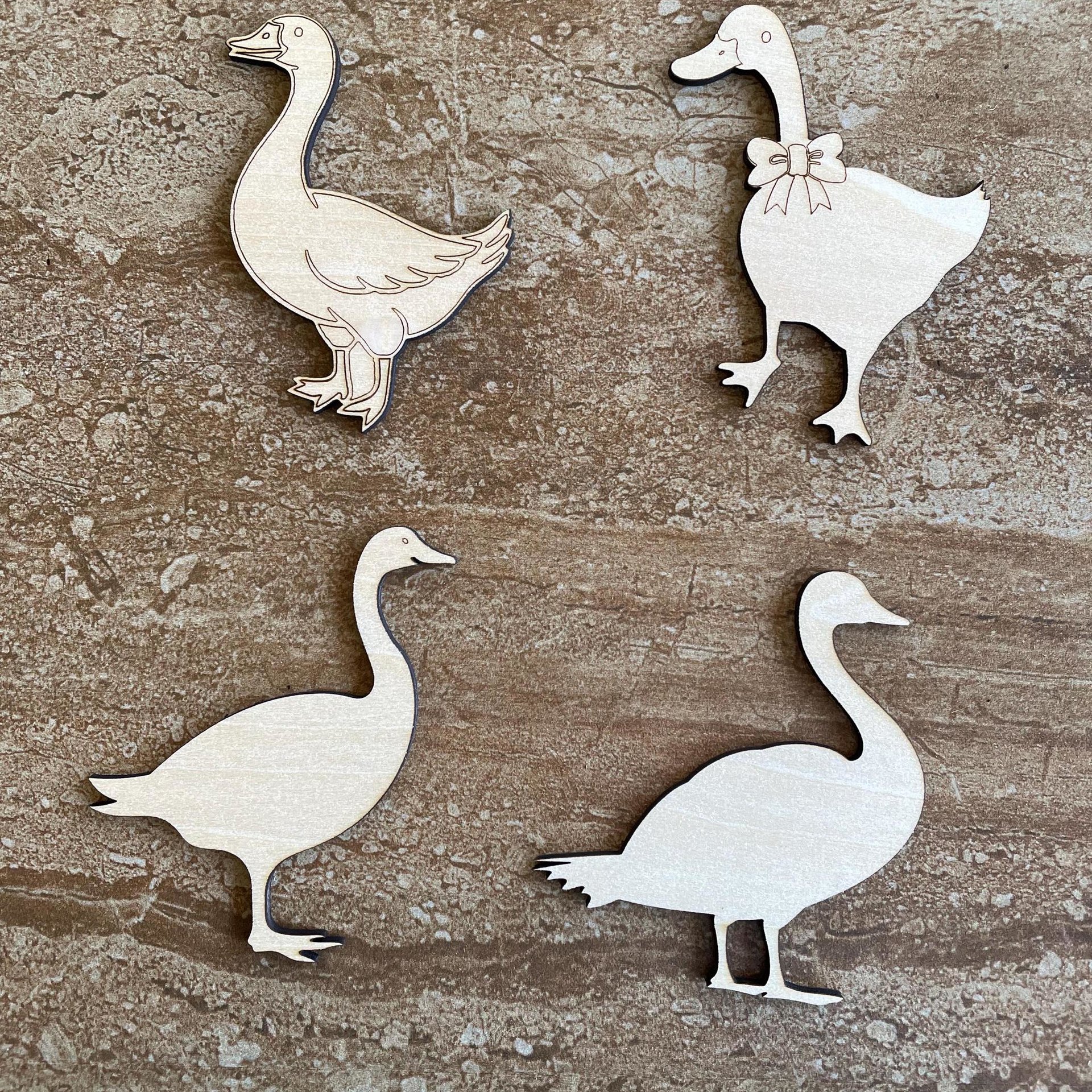 Handmade wooden DIY goose cutout in four unique styles, ready to paint or decorate