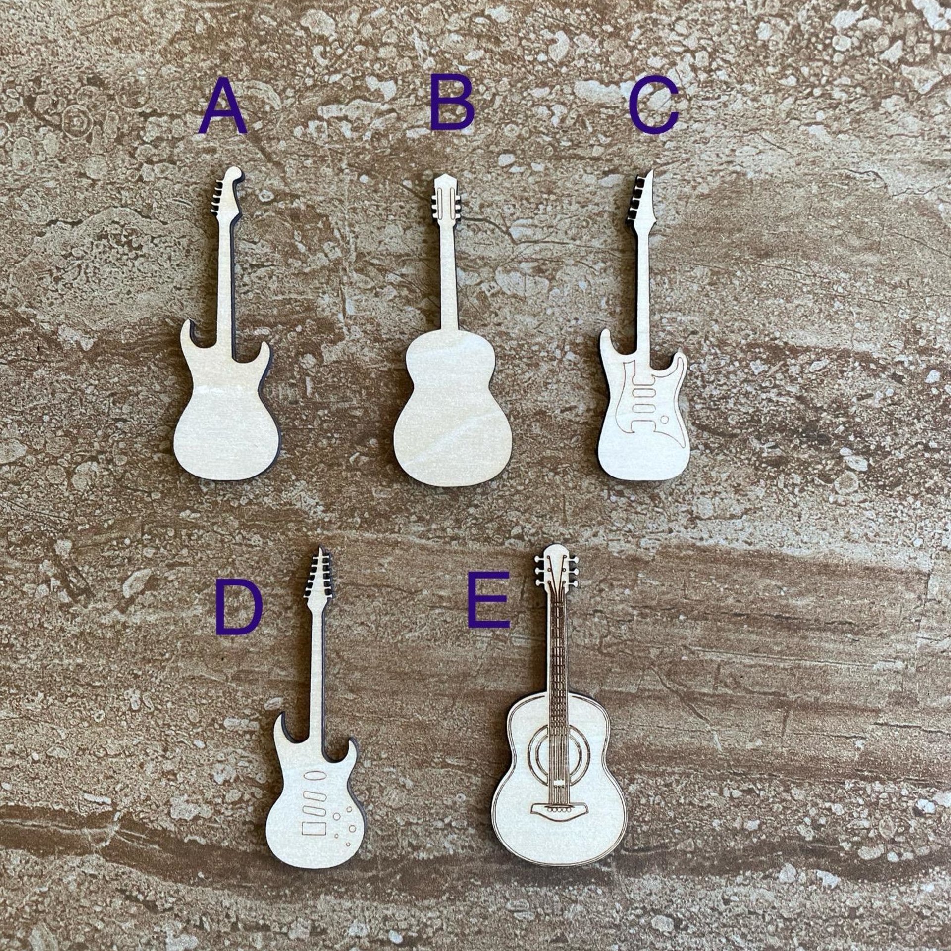 Handmade wooden DIY guitar cutout in five unique styles, ready for paint or decorating