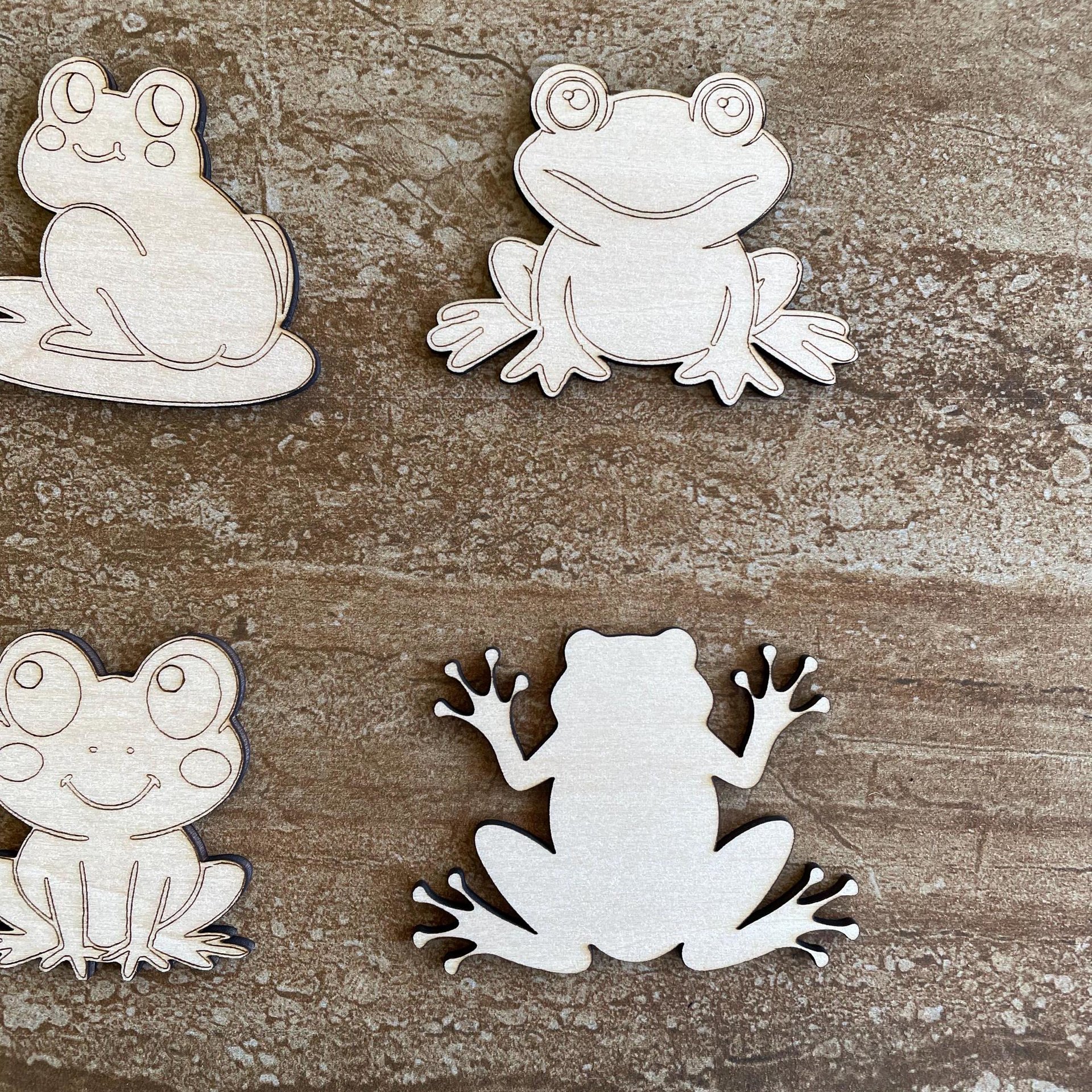 Handmade wooden DIY frog cutout in four unique styles, ready to paint or decorate