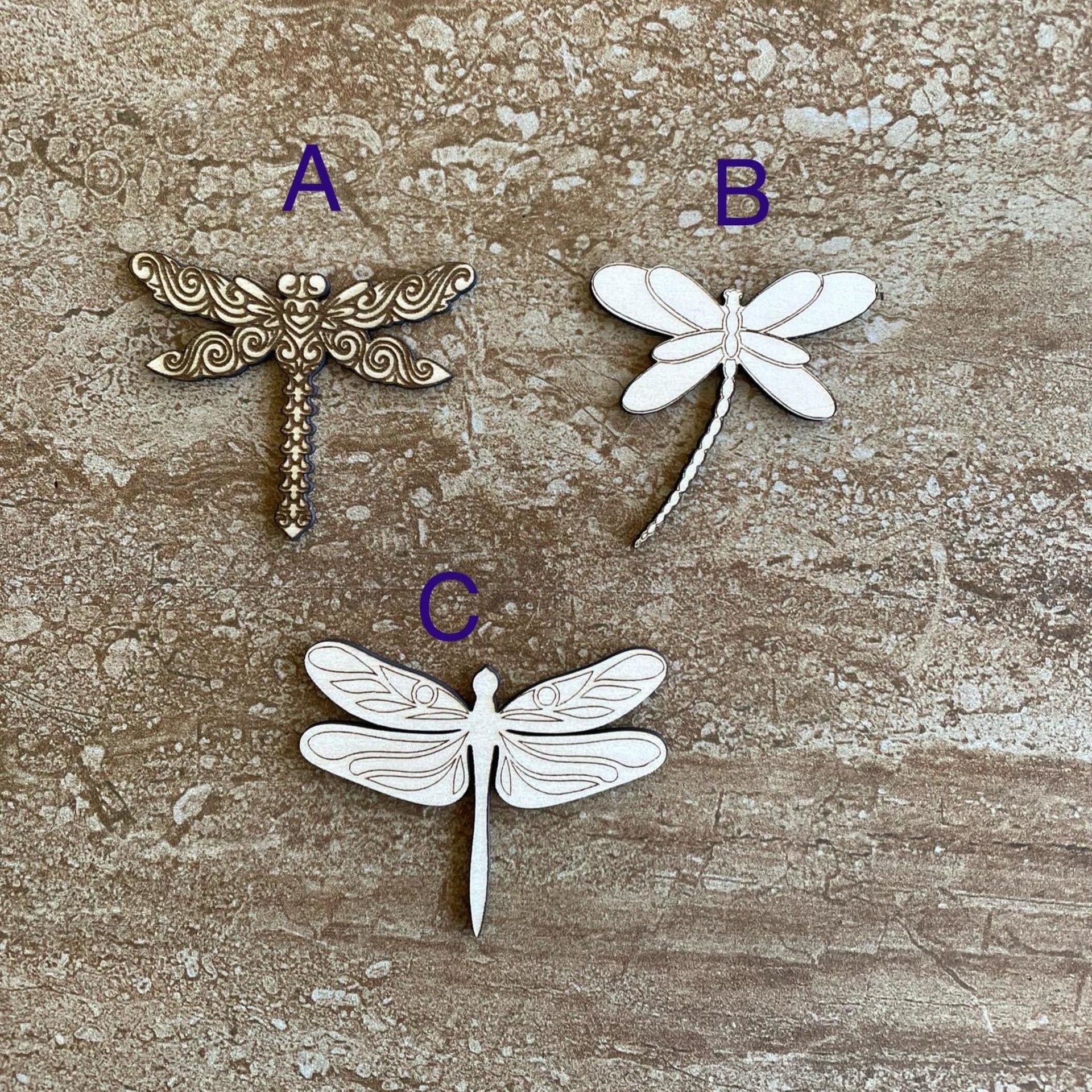 Handmade wooden DIY dragonfly cutout in three unique styles, ready to paint or decorate