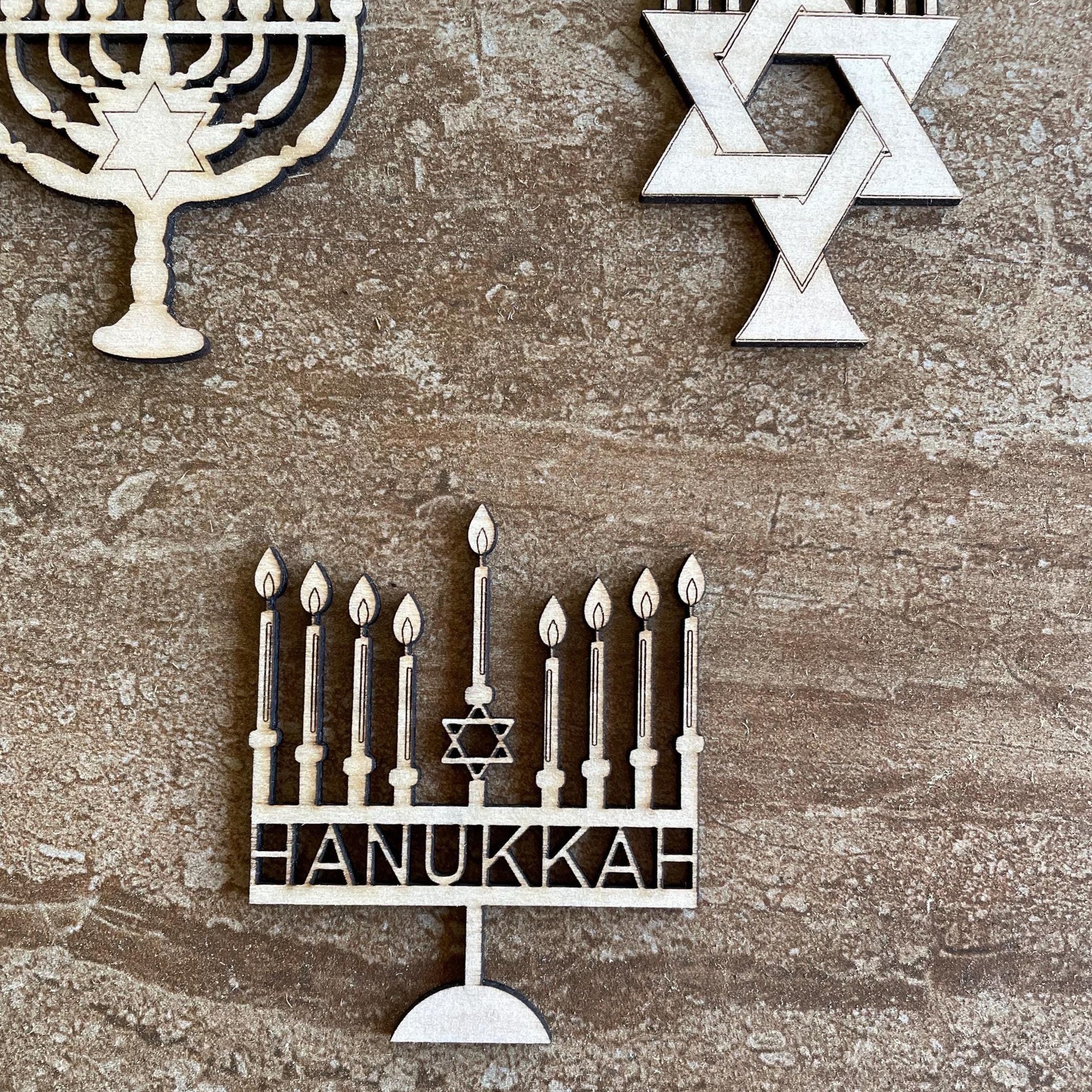 Handmade wooden DIY menorah cutout in three unique styles, ready for paint or decorating